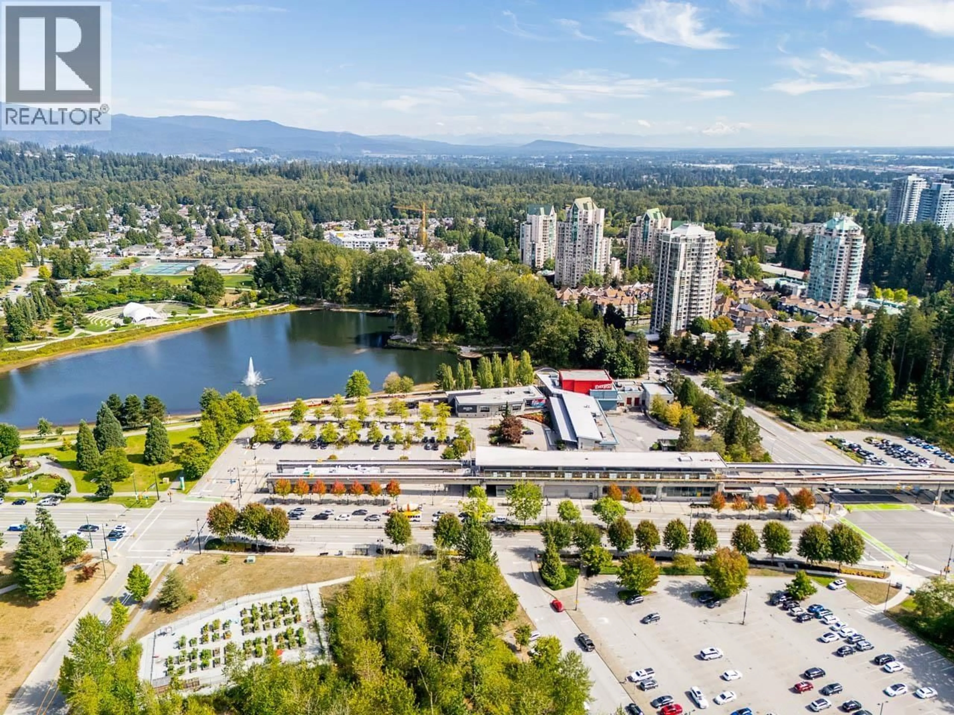 A pic from outside/outdoor area/front of a property/back of a property/a pic from drone, water/lake/river/ocean view for 206 - 2990 PRINCESS CRESCENT, Coquitlam British Columbia V3B7R3