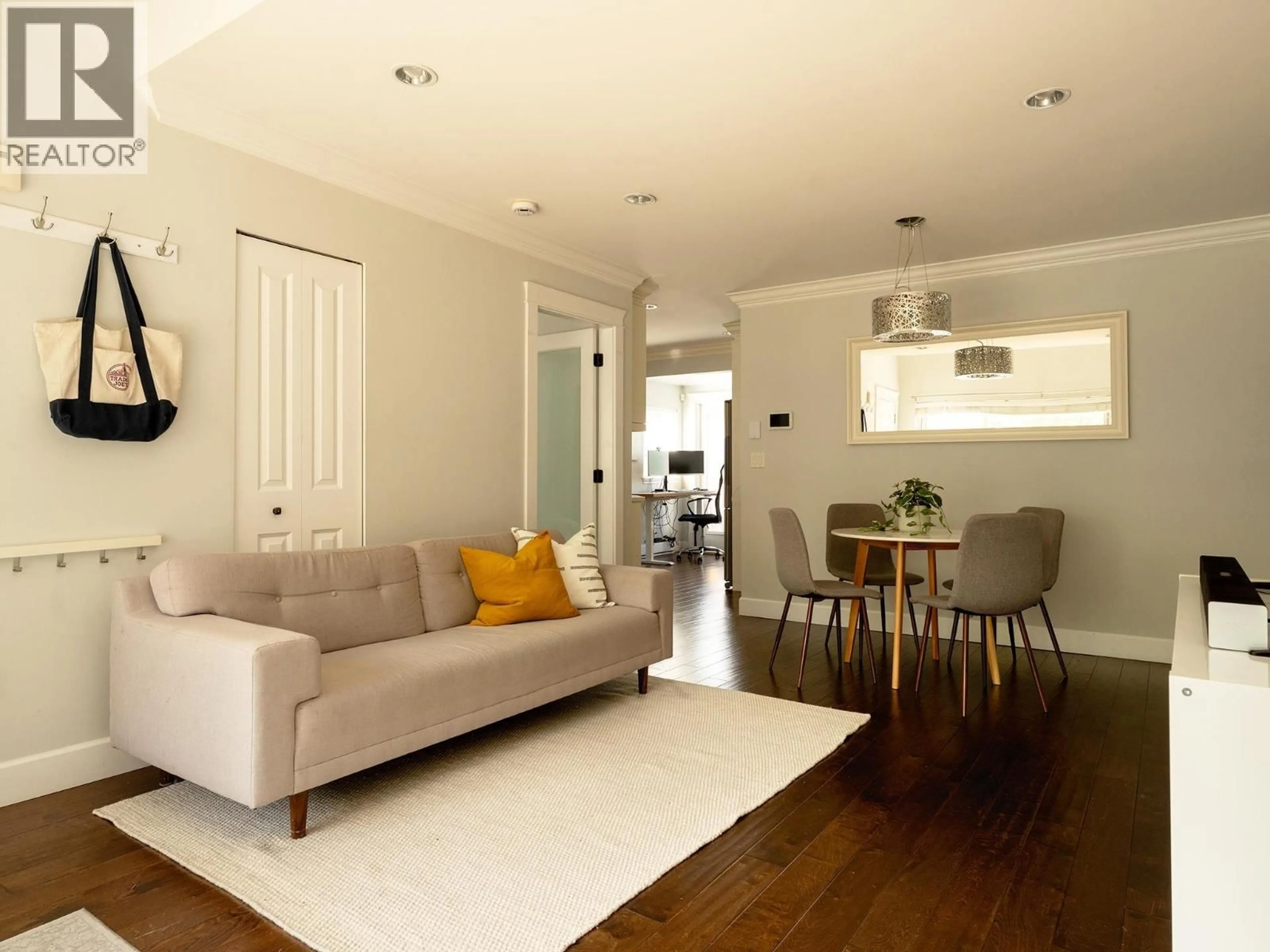 Living room with furniture, wood/laminate floor for 4883 BEATRICE STREET, Vancouver British Columbia V5N4J5
