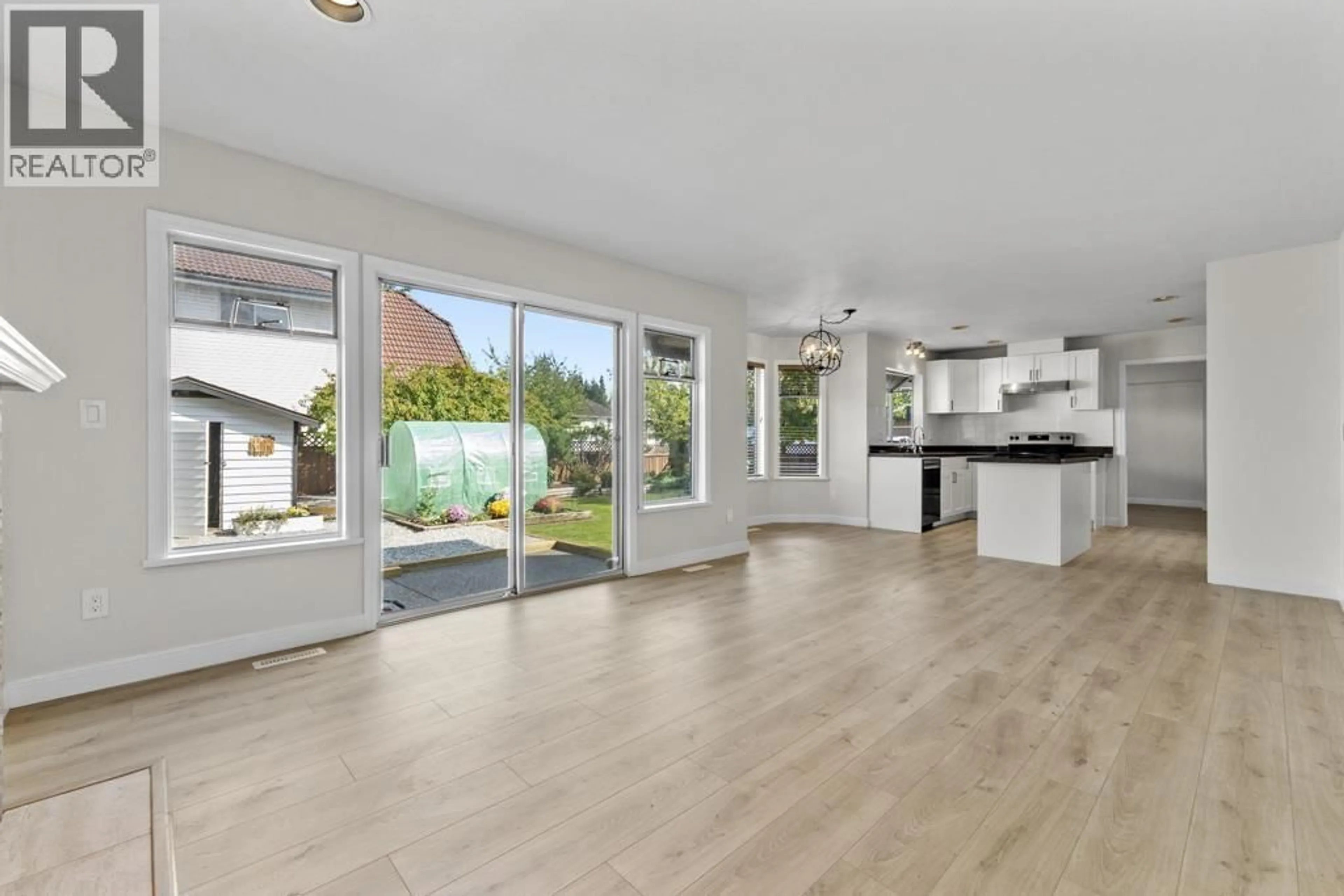 Open concept kitchen, wood/laminate floor for 1830 WALNUT CRESCENT, Coquitlam British Columbia V3J7T5