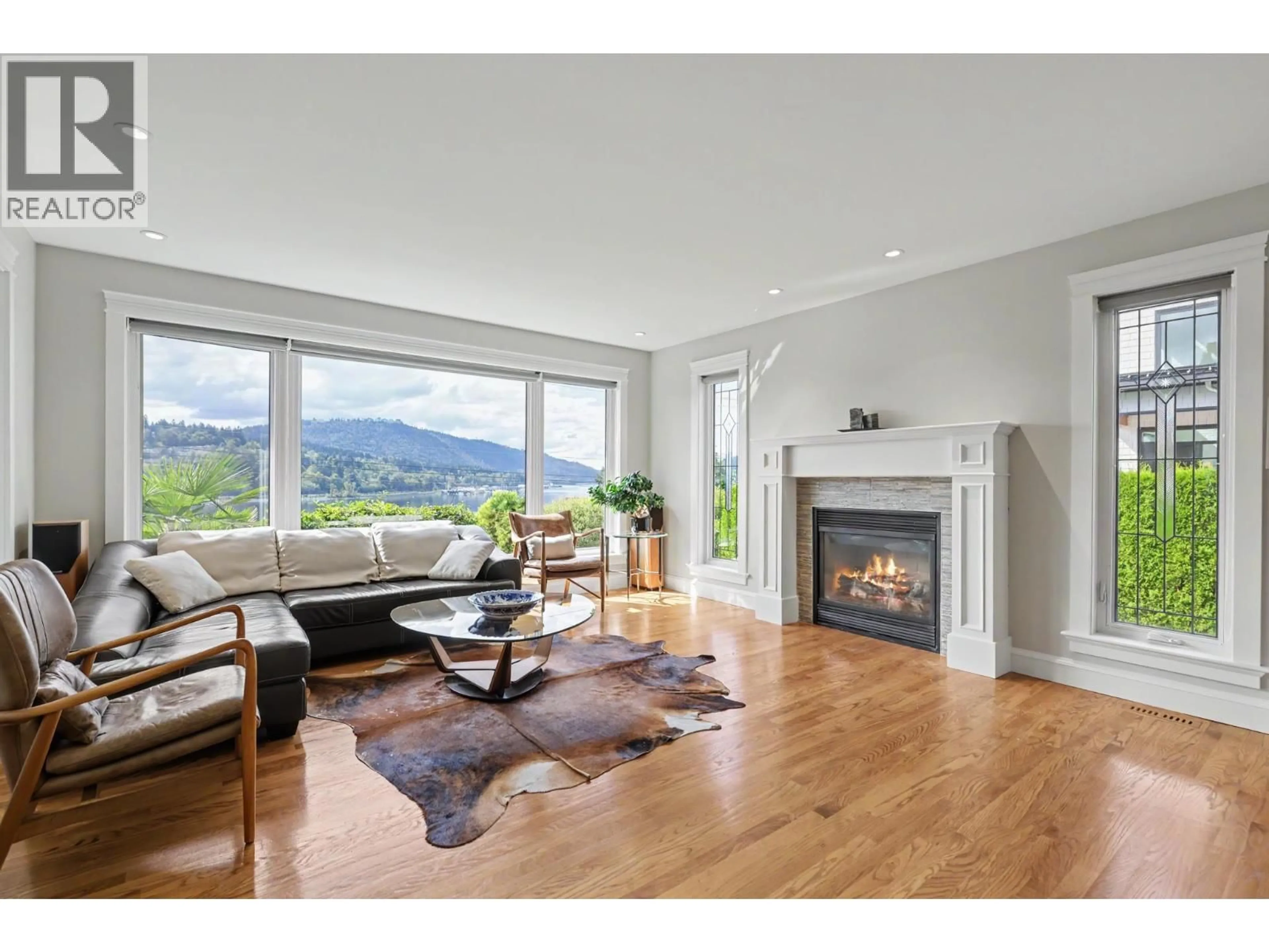 Living room with furniture, wood/laminate floor for 1123 IOCO ROAD, Port Moody British Columbia V3H2W9