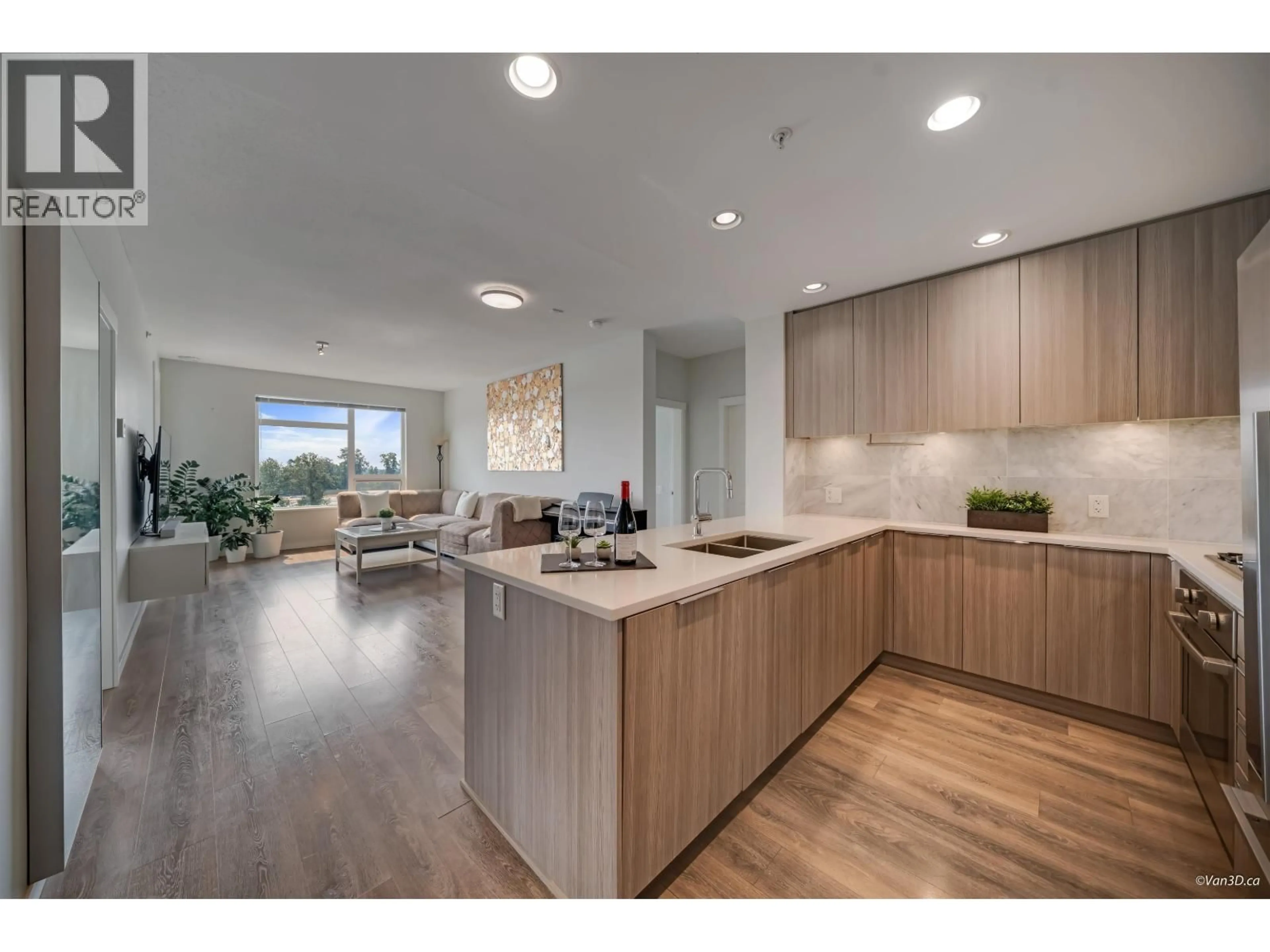 Open concept kitchen, wood/laminate floor for 603 - 3289 RIVERWALK AVENUE, Vancouver British Columbia V5S0G2