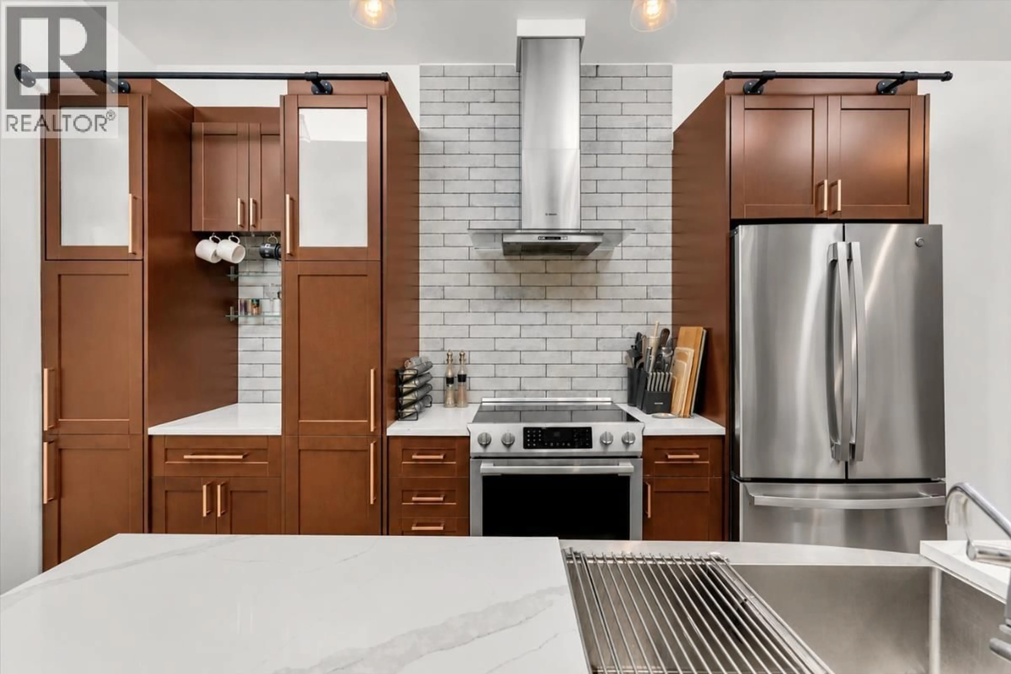 Contemporary kitchen, ceramic/tile floor for 304 - 1420 7TH AVENUE, Vancouver British Columbia V5N1R8