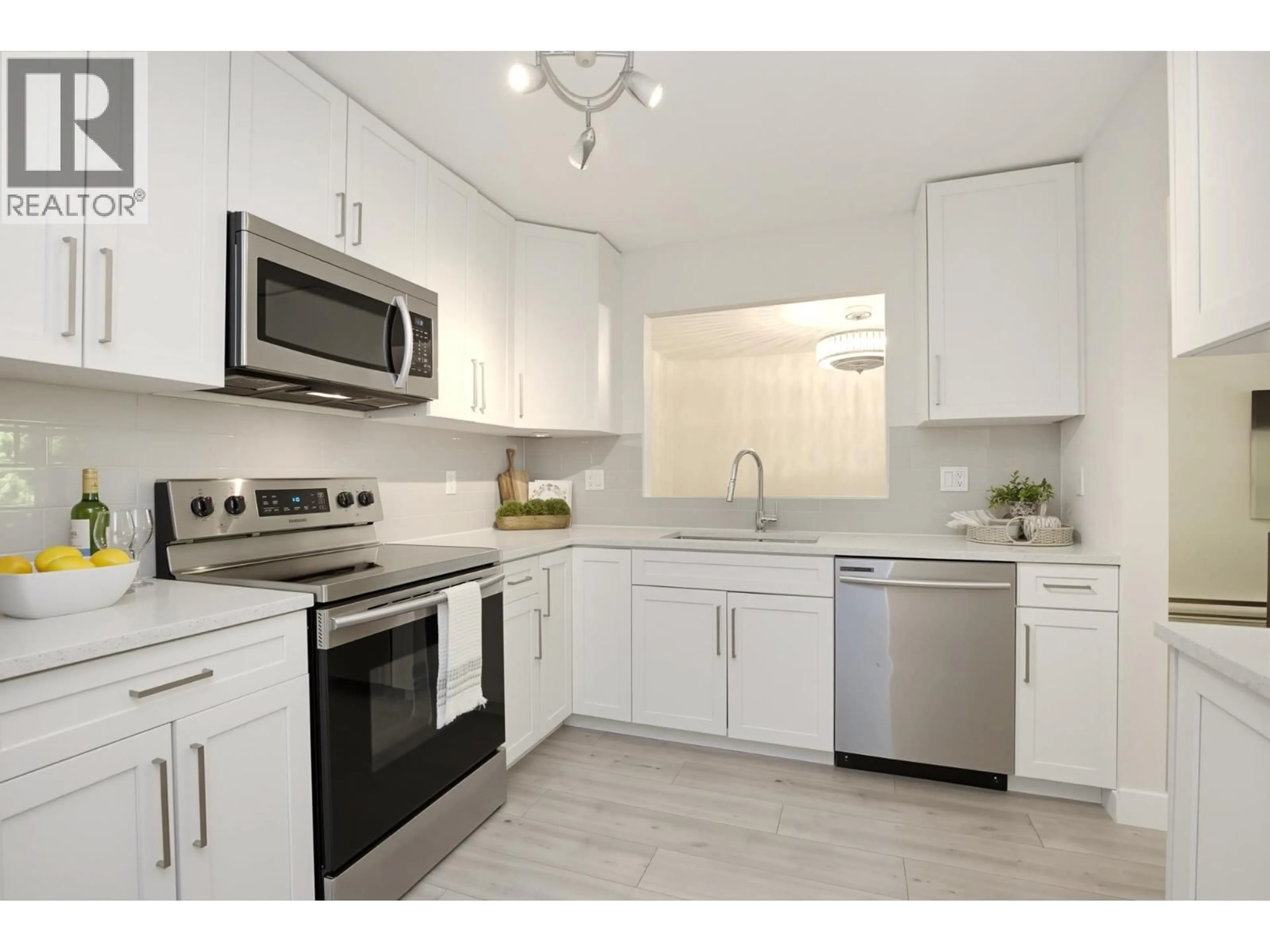 Standard kitchen, ceramic/tile floor for 107 - 19241 FORD ROAD, Pitt Meadows British Columbia V3Y2N4