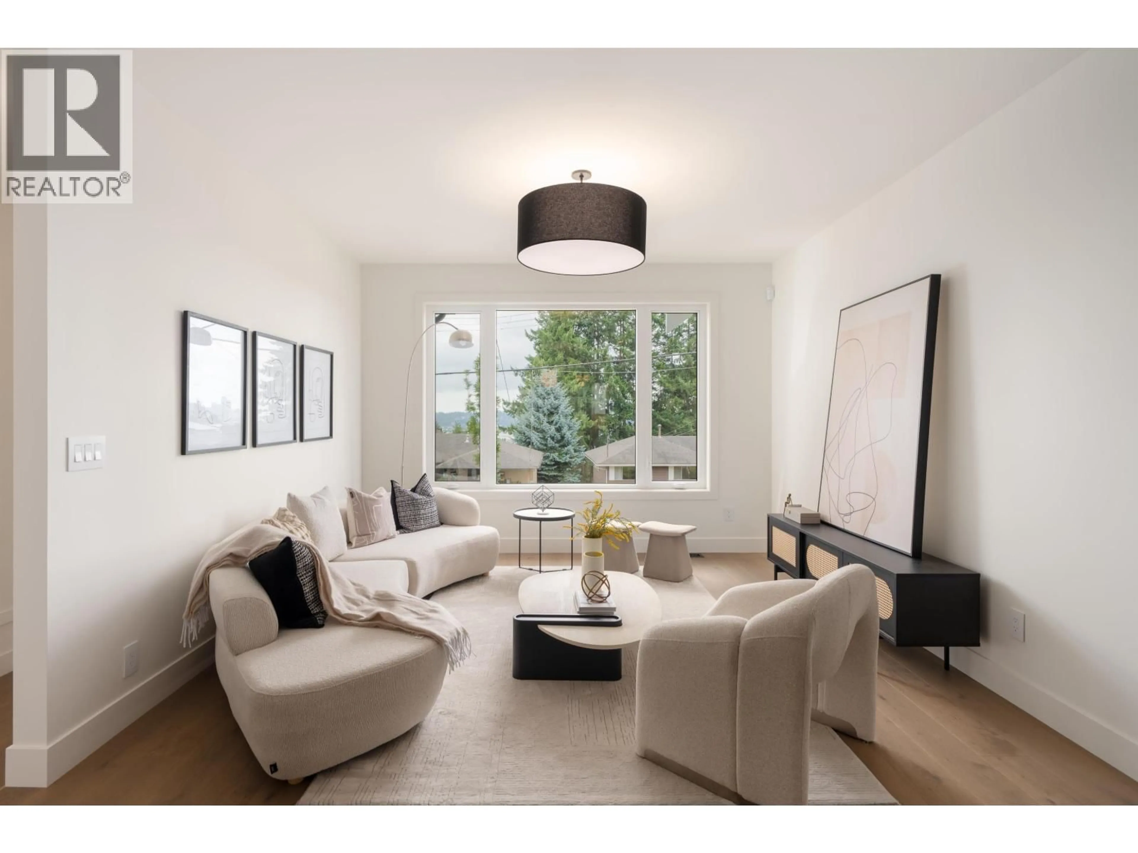 Living room with furniture, unknown for 102 - 903 EDGAR AVENUE, Coquitlam British Columbia V3K2K1