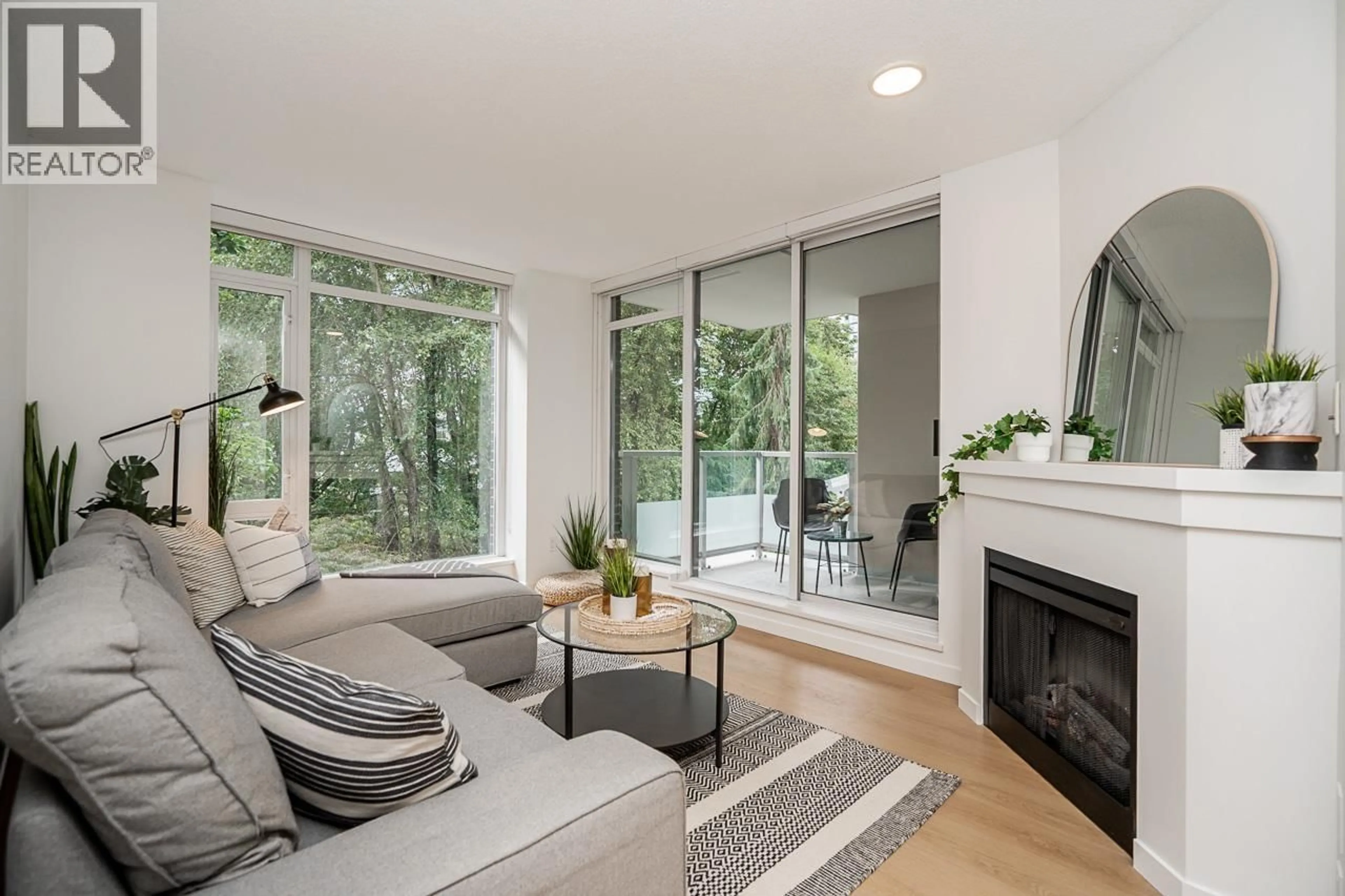 Living room with furniture, unknown for 201 - 2133 DOUGLAS ROAD, Burnaby British Columbia V5C0E9
