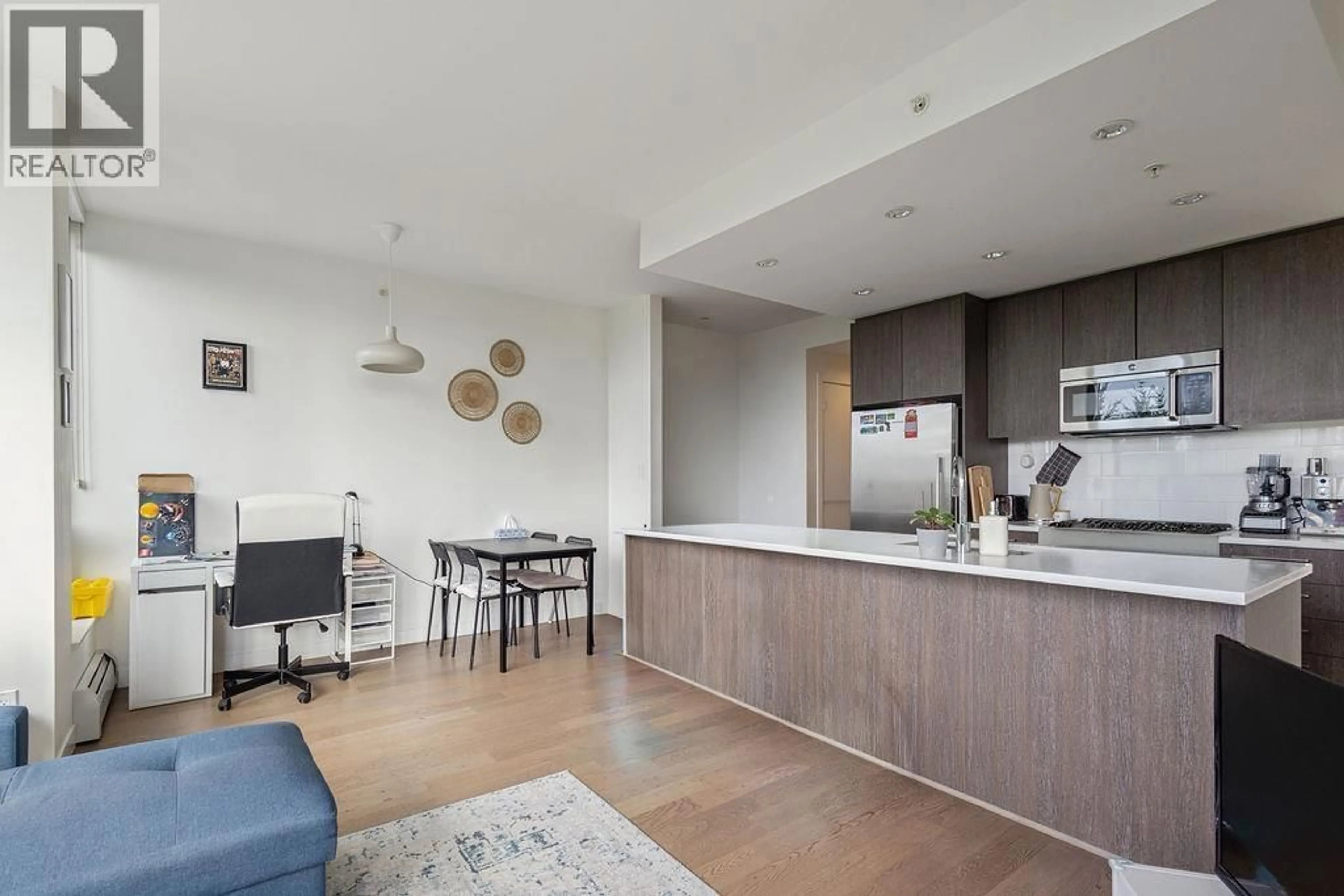Open concept kitchen, unknown for 702 - 9060 UNIVERSITY CRESCENT, Burnaby British Columbia V5A0E1