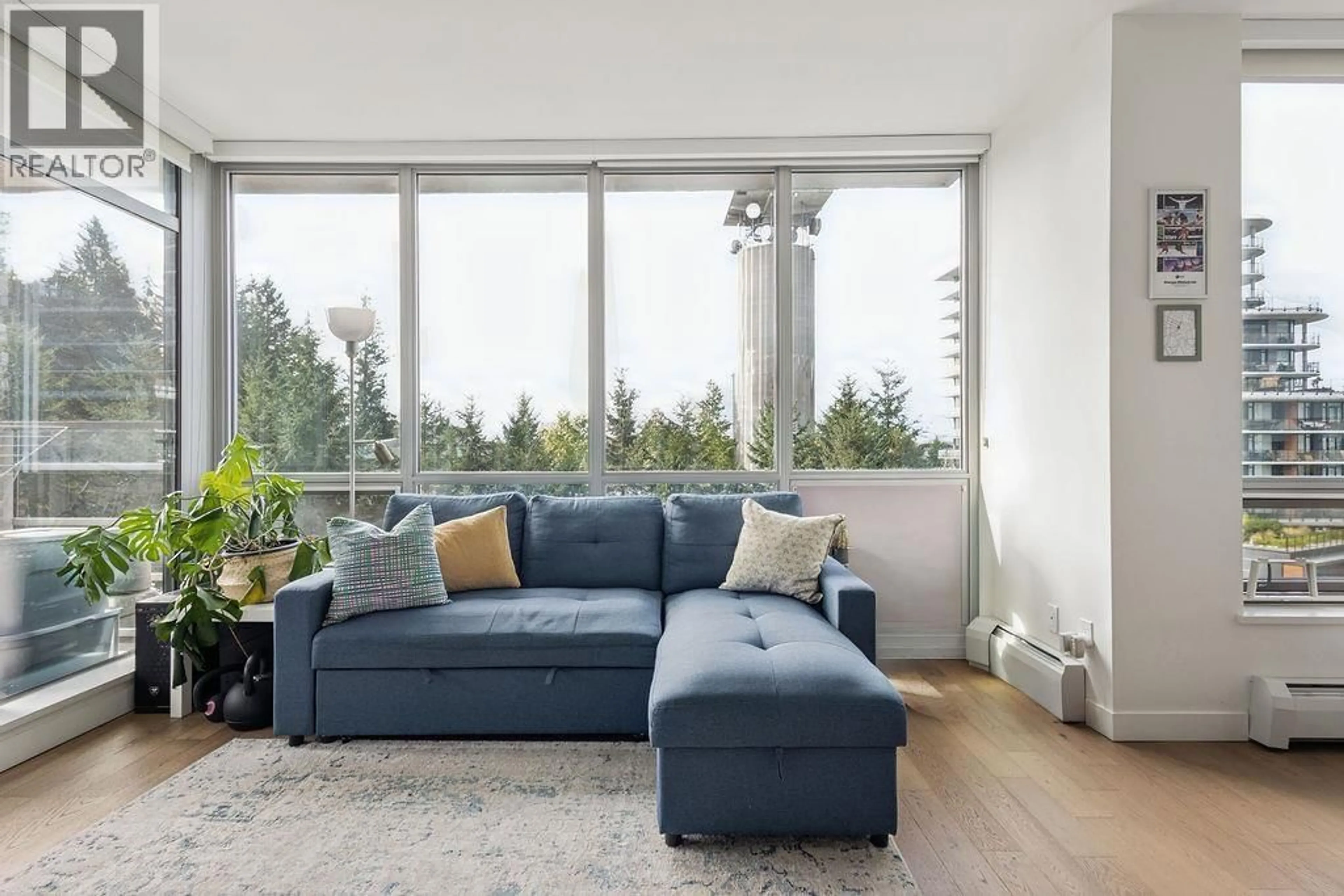 Living room with furniture, unknown for 702 - 9060 UNIVERSITY CRESCENT, Burnaby British Columbia V5A0E1