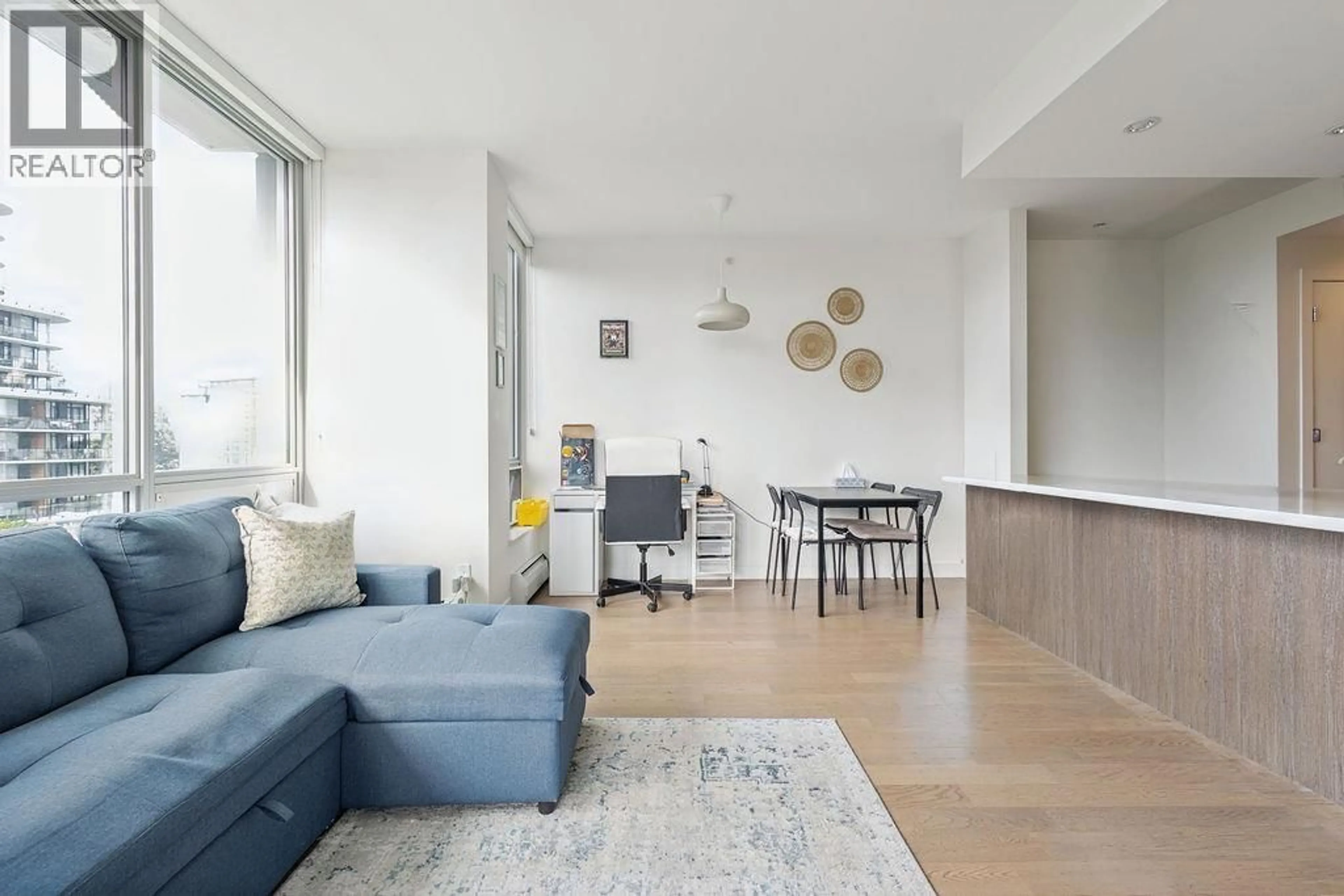 Living room with furniture, unknown for 702 - 9060 UNIVERSITY CRESCENT, Burnaby British Columbia V5A0E1