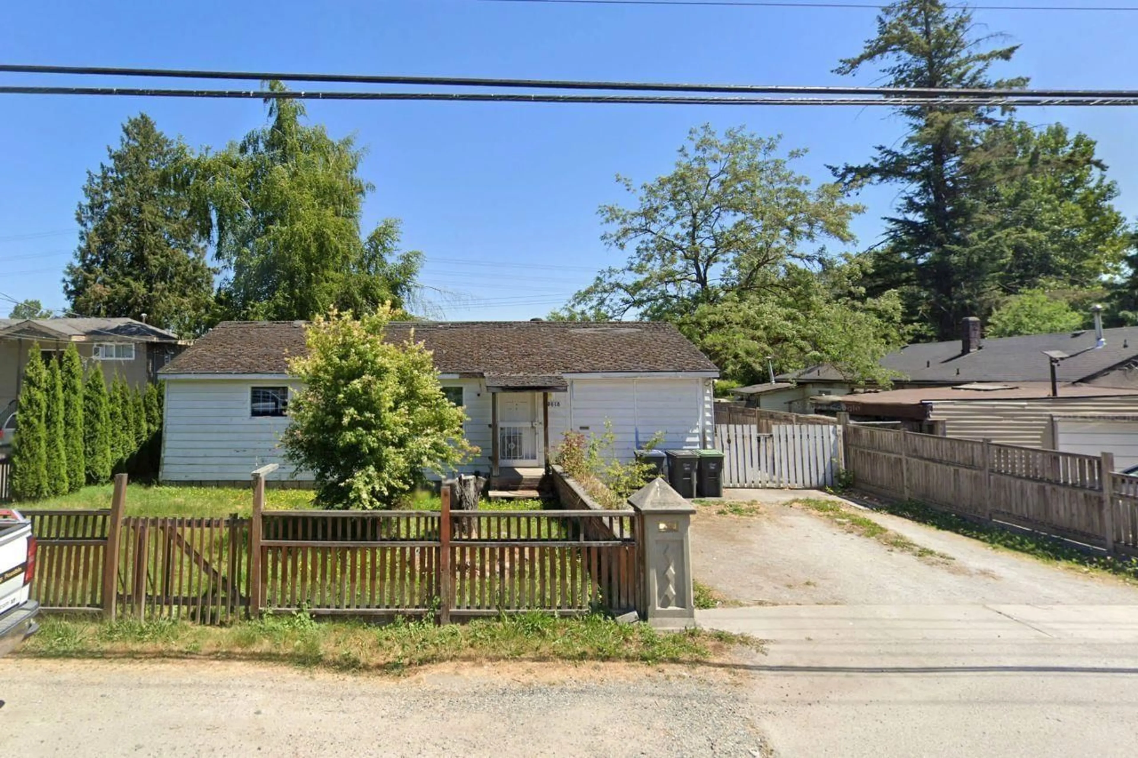 A pic from outside/outdoor area/front of a property/back of a property/a pic from drone, street for 10618 140 STREET, Surrey British Columbia V3T4N8