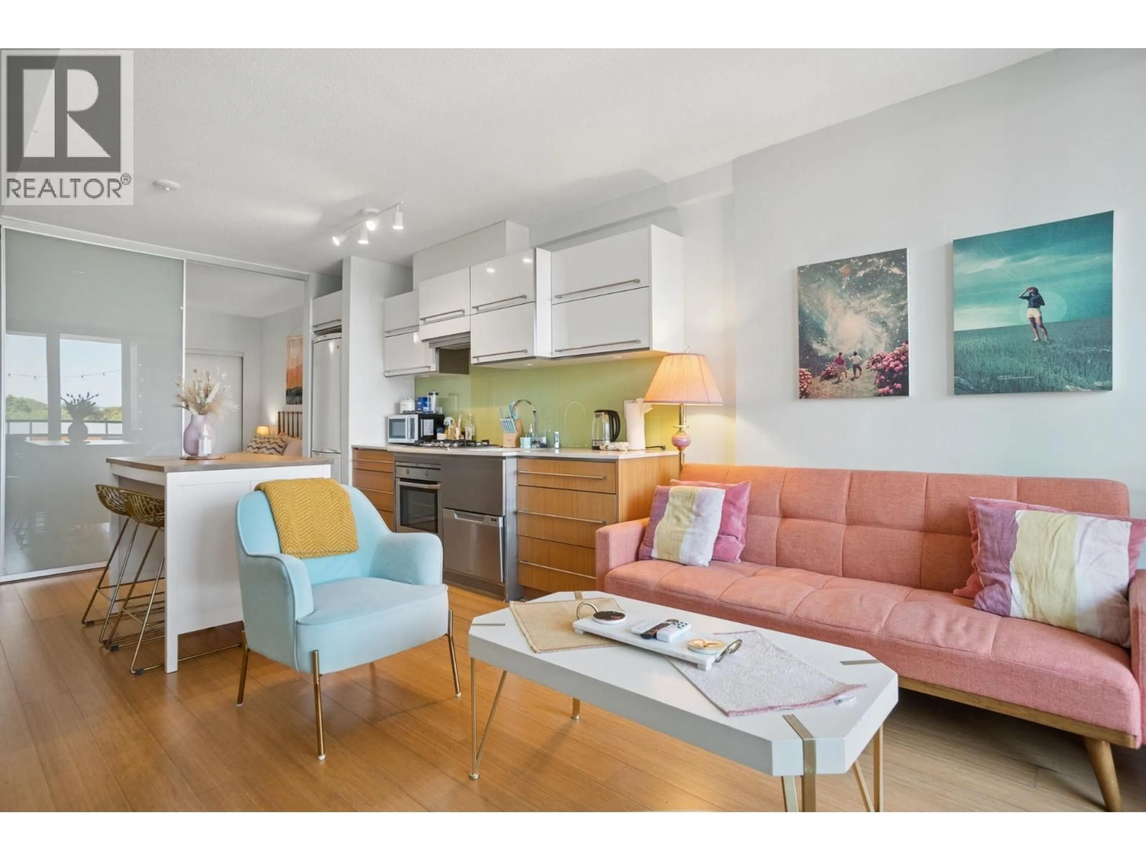 Living room with furniture, wood/laminate floor for 709 - 718 MAIN STREET, Vancouver British Columbia V6A0B1
