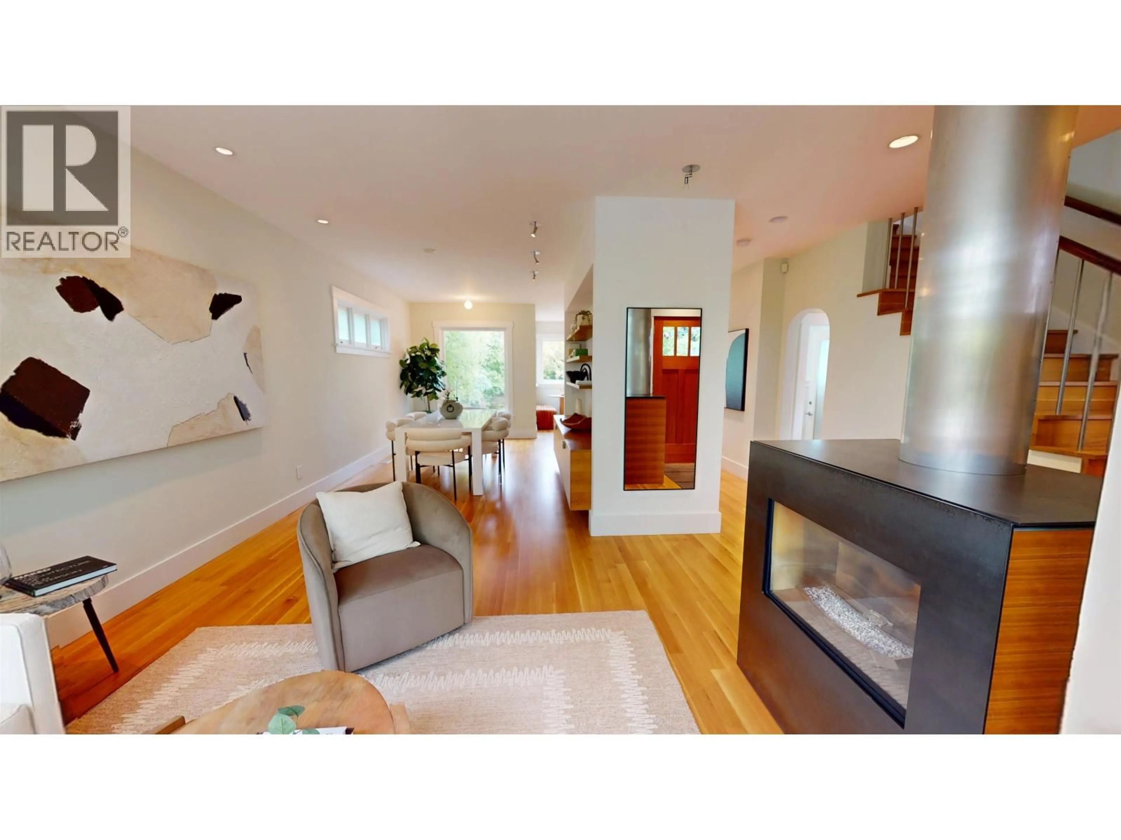 Living room with furniture, wood/laminate floor for 456 AUBREY PLACE, Vancouver British Columbia V5V2T6