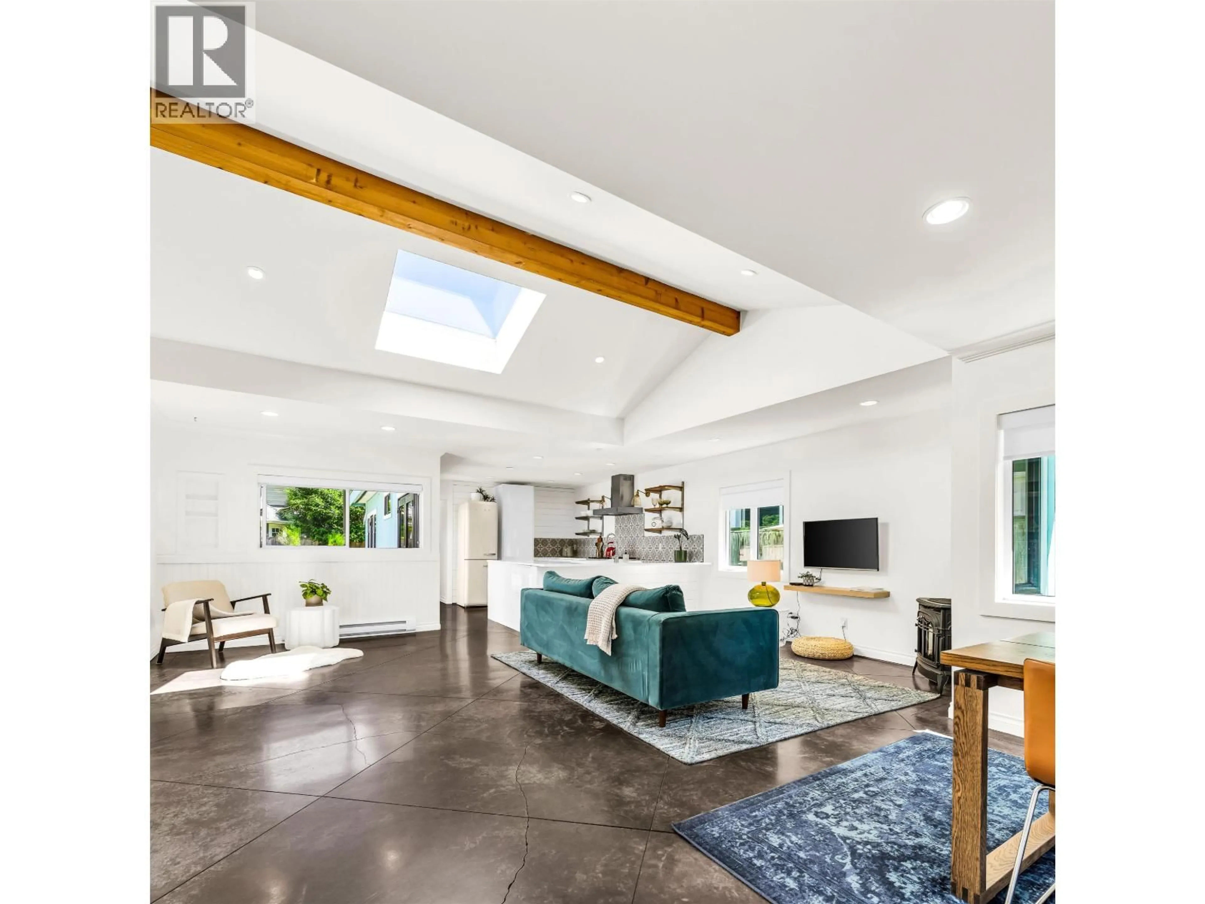 Living room with furniture, cement floor for 1348 ENDERBY AVENUE, Delta British Columbia V4L1S3