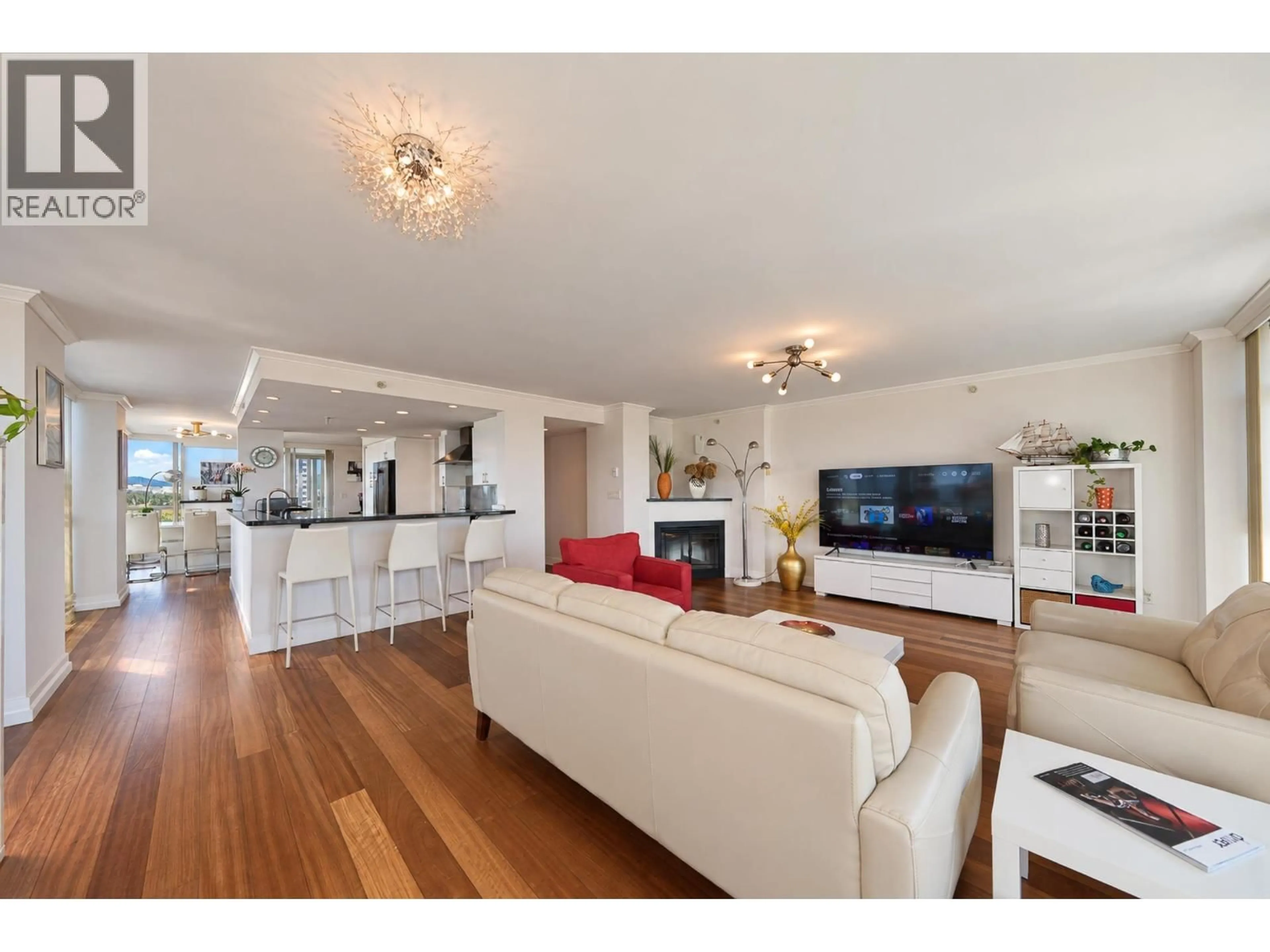 Living room with furniture, wood/laminate floor for 2701 - 4400 BUCHANAN STREET, Burnaby British Columbia V5C0E3