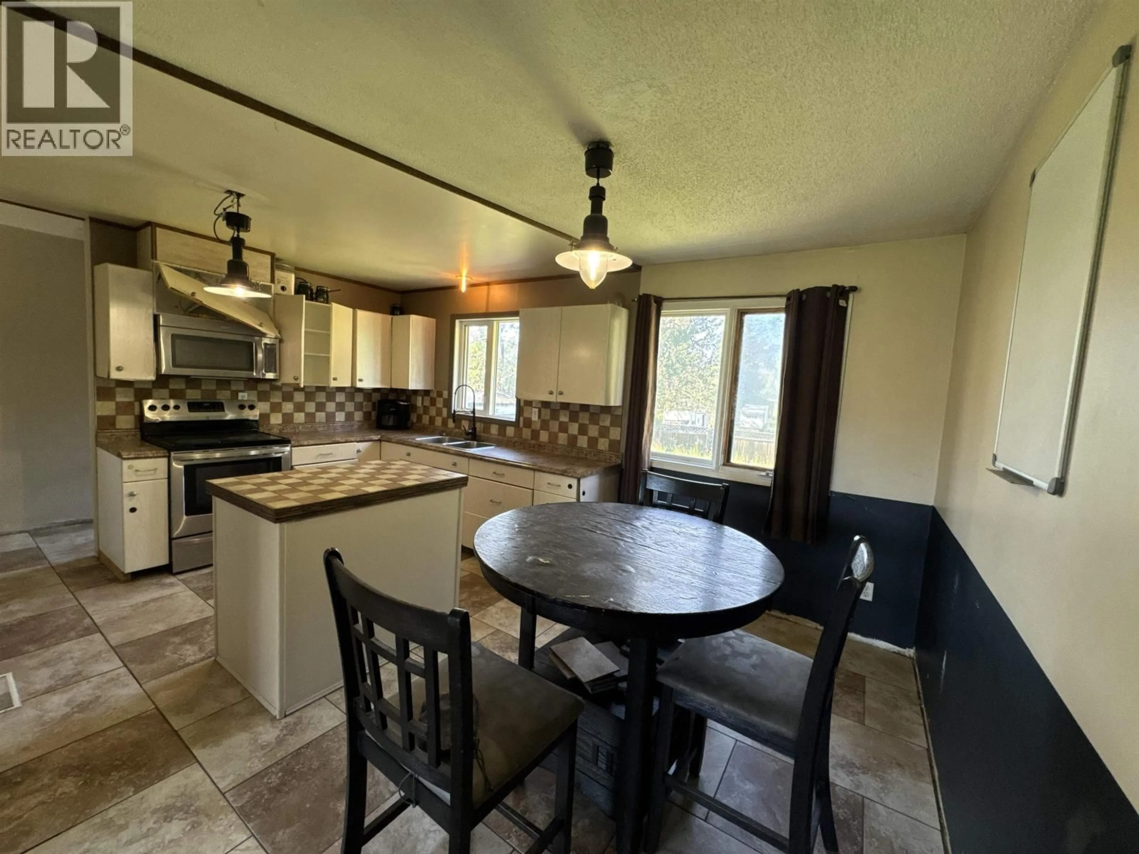 Open concept kitchen, ceramic/tile floor for 9707 WILLOW ROAD, Fort St. John British Columbia V1J8A5