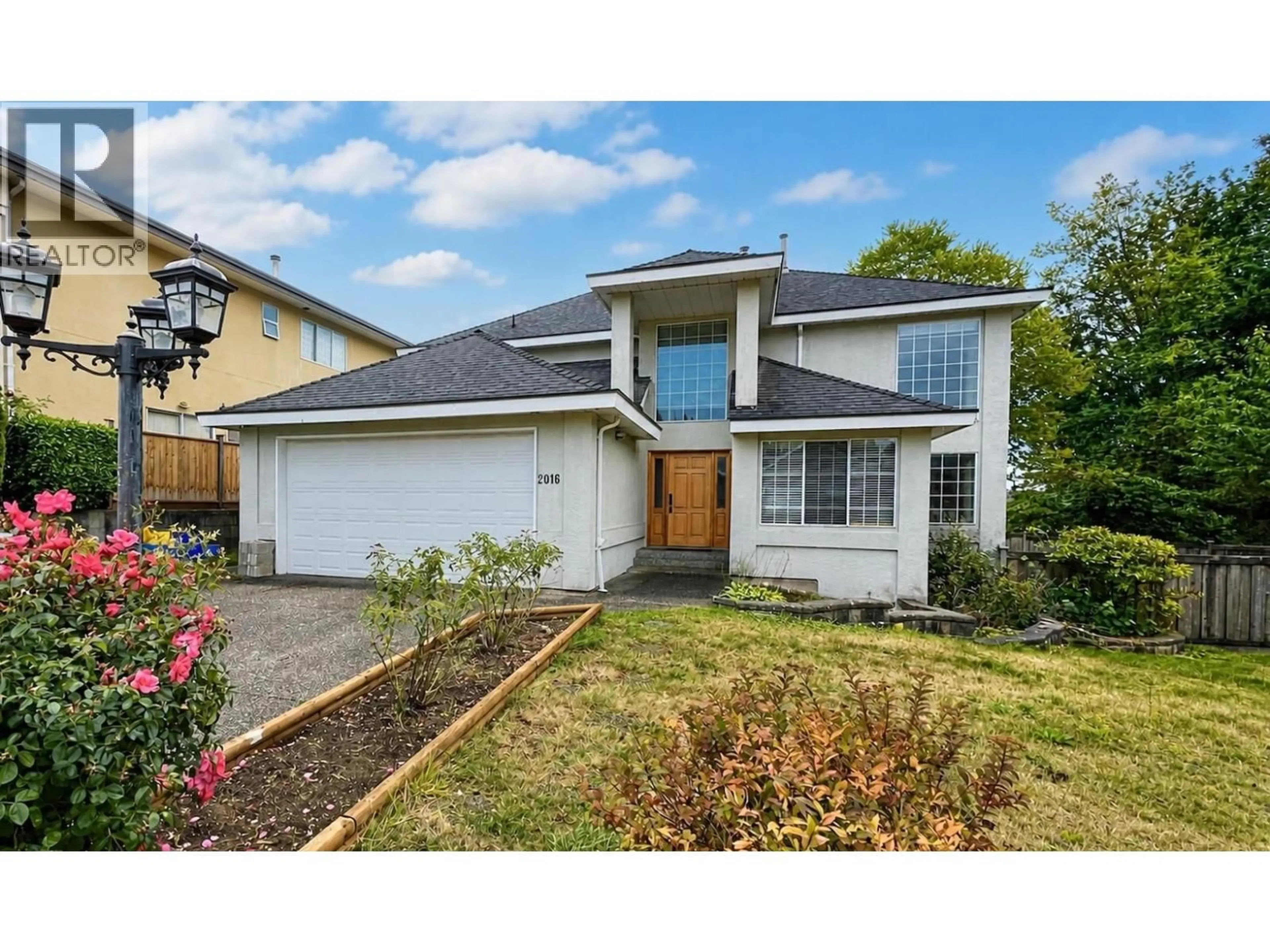 Home with vinyl exterior material, street for 2016 WINTER CRESCENT, Coquitlam British Columbia V3K6T6