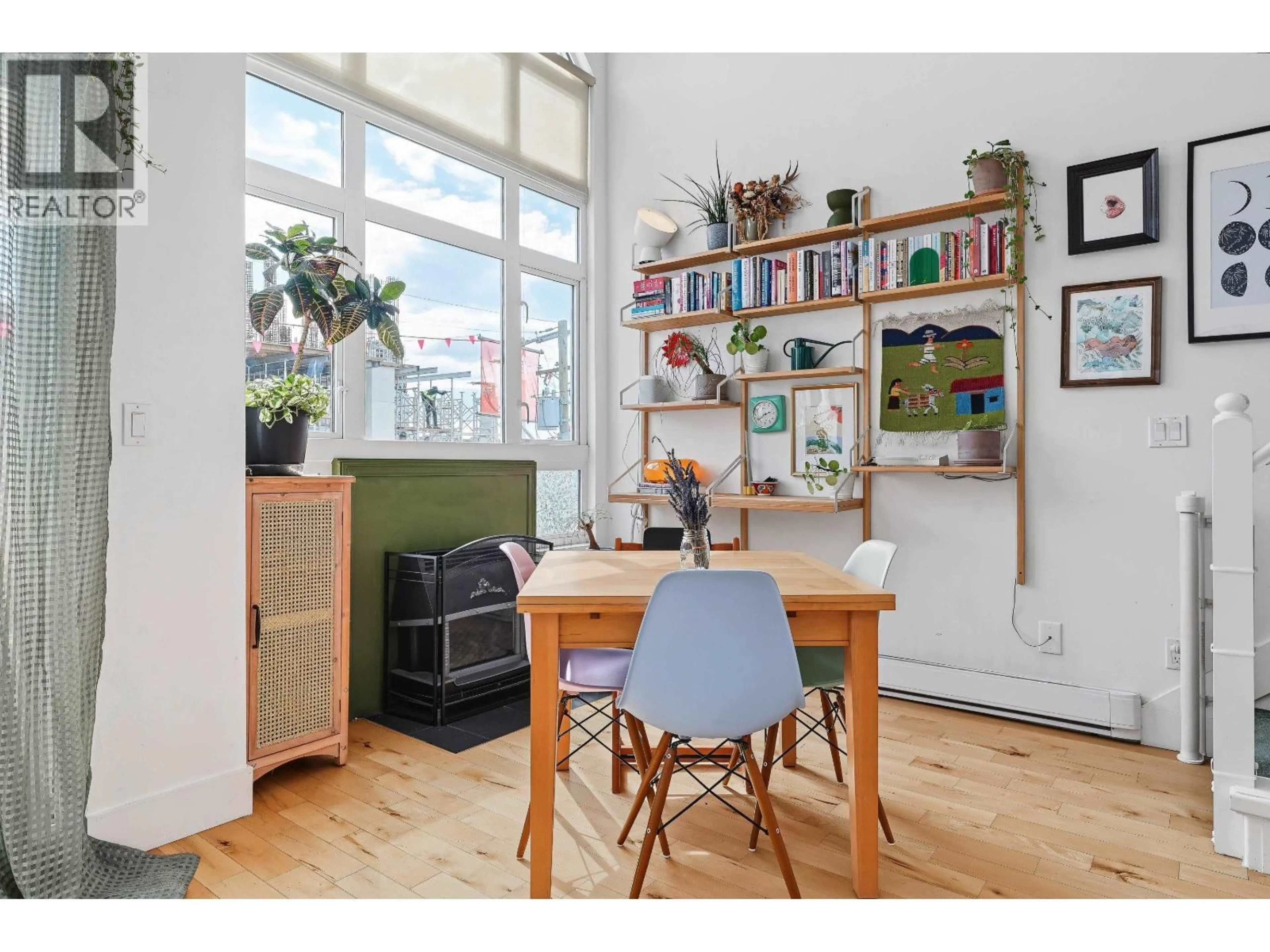 Open concept kitchen, wood/laminate floor for 308 - 1330 GRAVELEY STREET, Vancouver British Columbia V5L3A2
