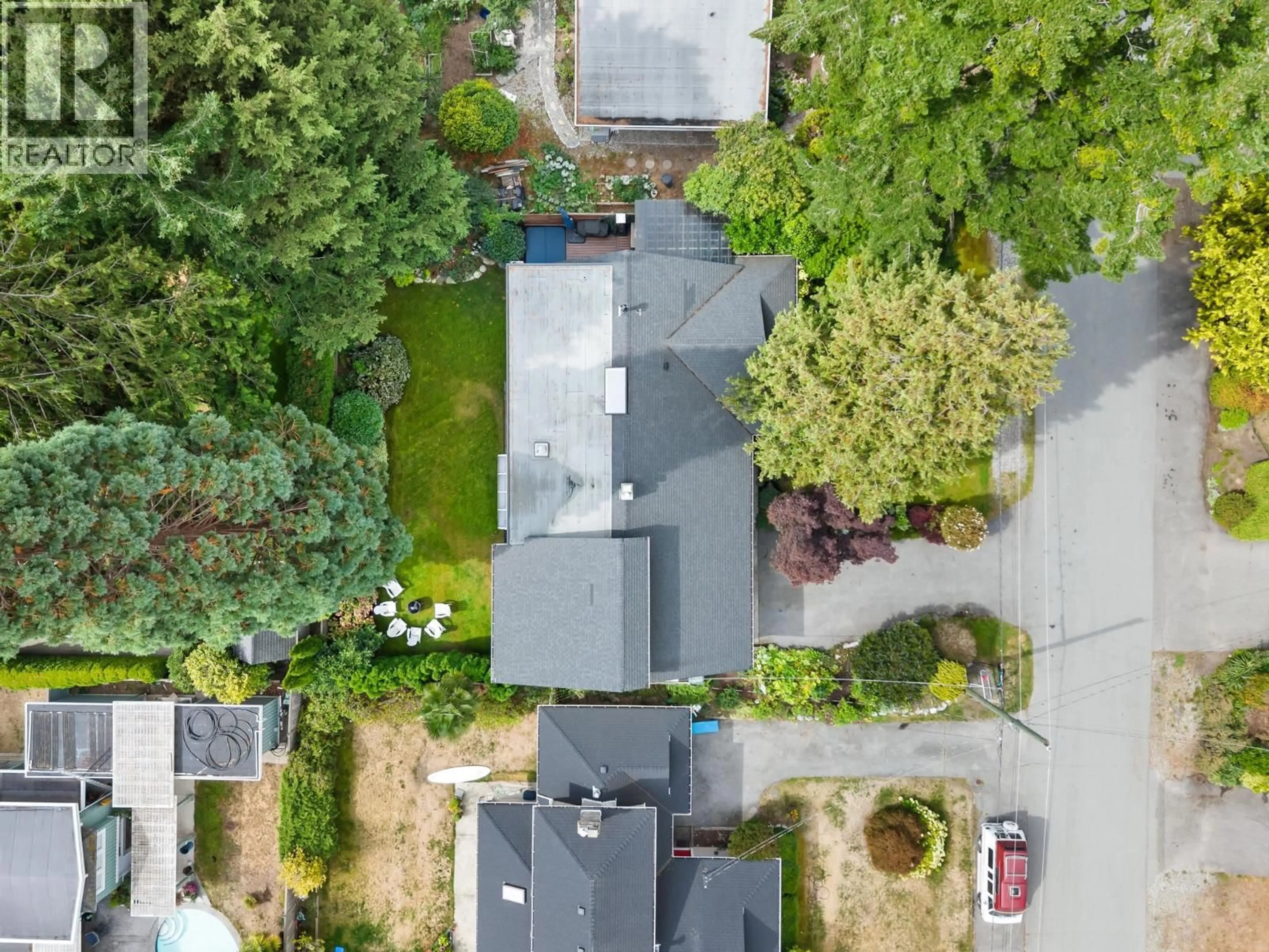A pic from outside/outdoor area/front of a property/back of a property/a pic from drone, street for 4844 7A AVENUE, Delta British Columbia V4M1R2