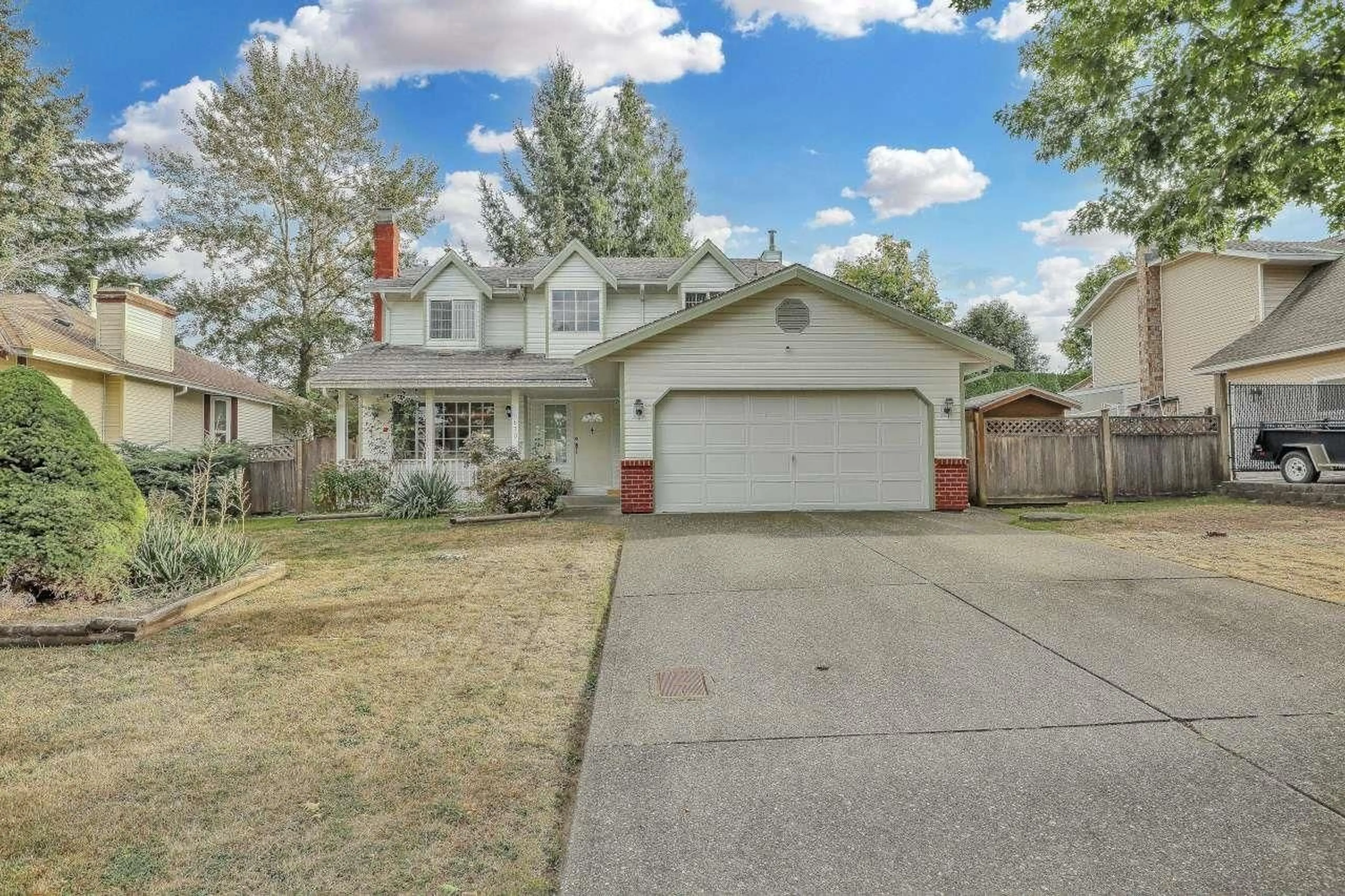 Home with vinyl exterior material, street for 15870 95 AVENUE, Surrey British Columbia V4N3B9