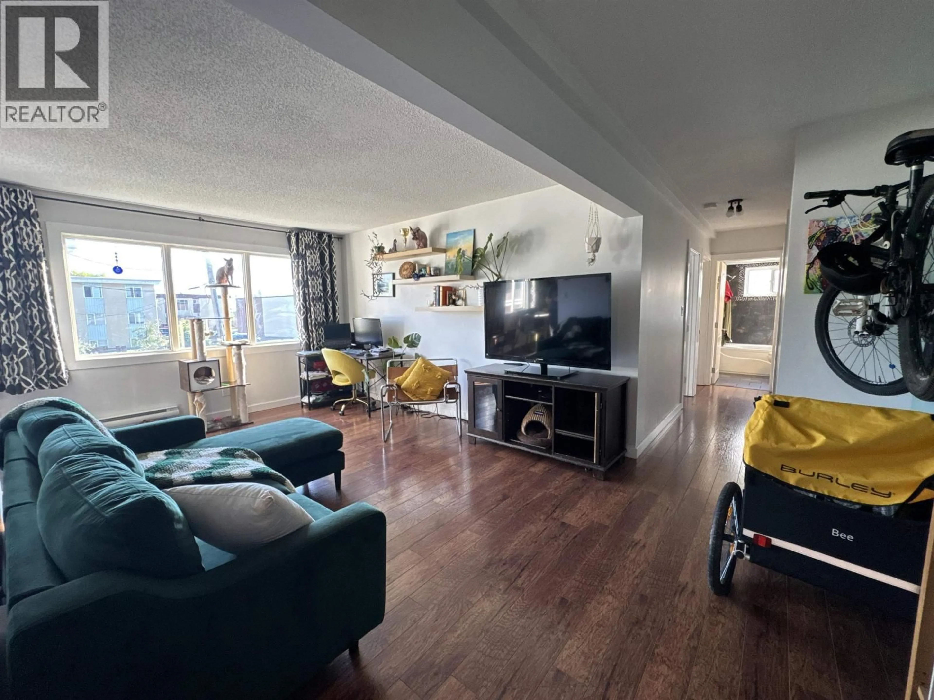 Living room with furniture, unknown for 208 - 9815 104 AVENUE, Fort St. John British Columbia V1J2K4