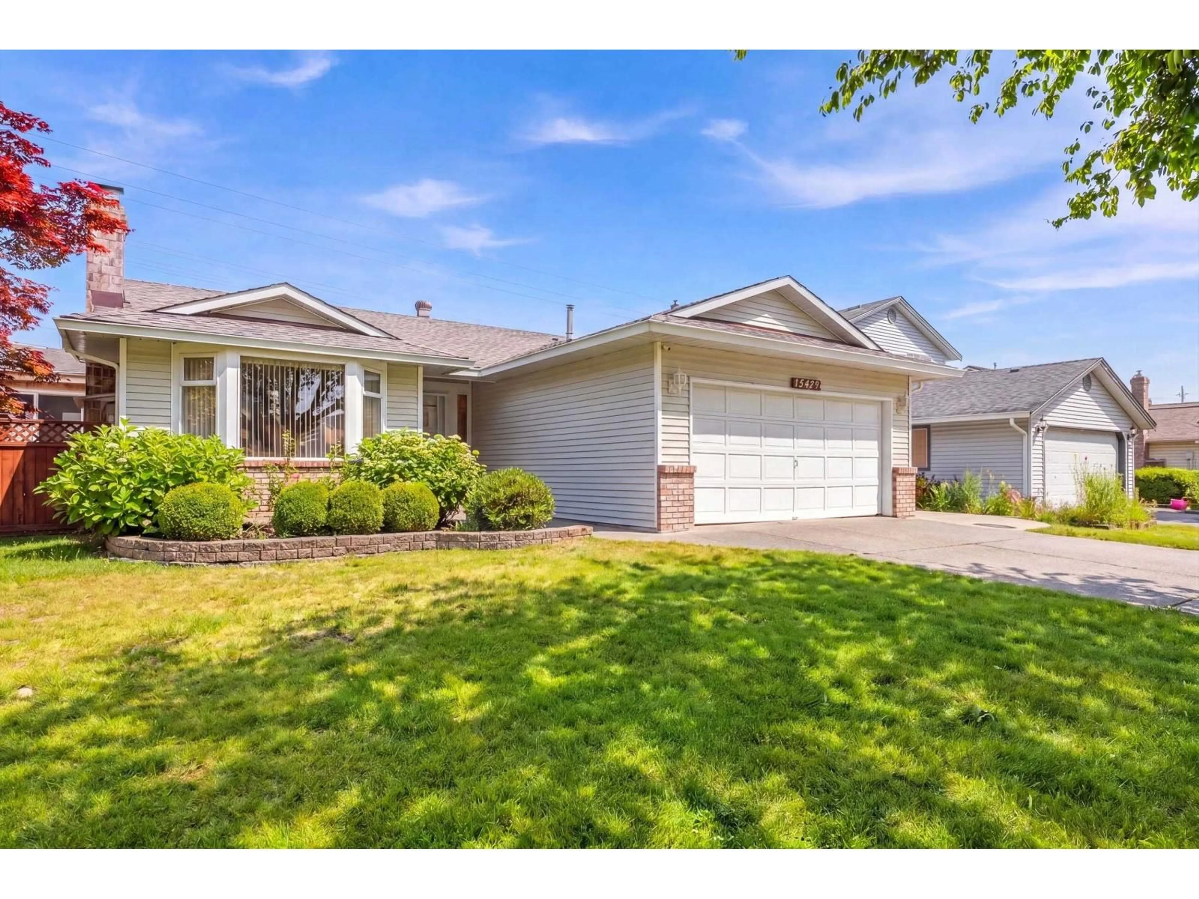 Home with vinyl exterior material, street for 15429 95 AVENUE, Surrey British Columbia V3R9E4