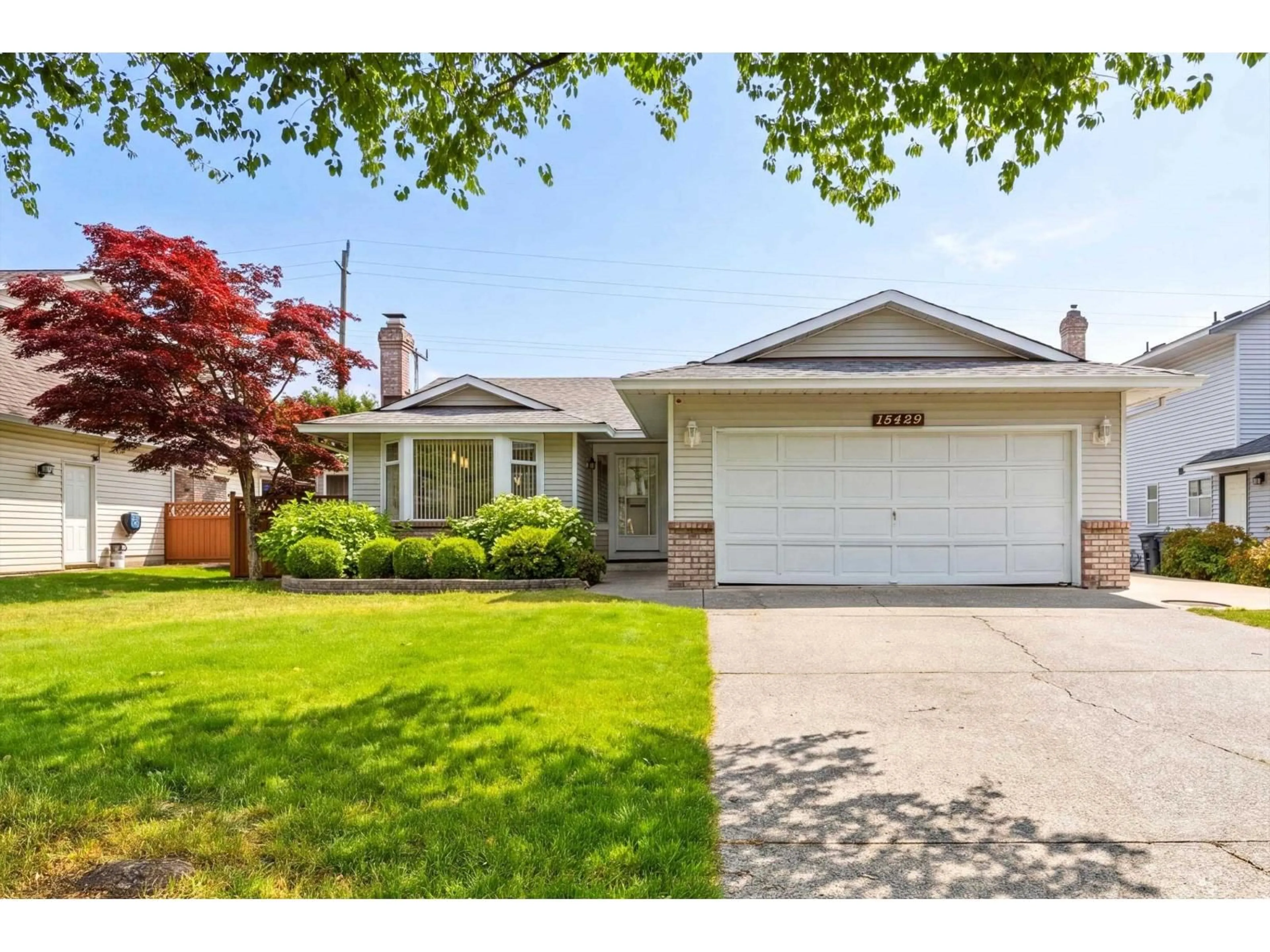 Home with vinyl exterior material, street for 15429 95 AVENUE, Surrey British Columbia V3R9E4