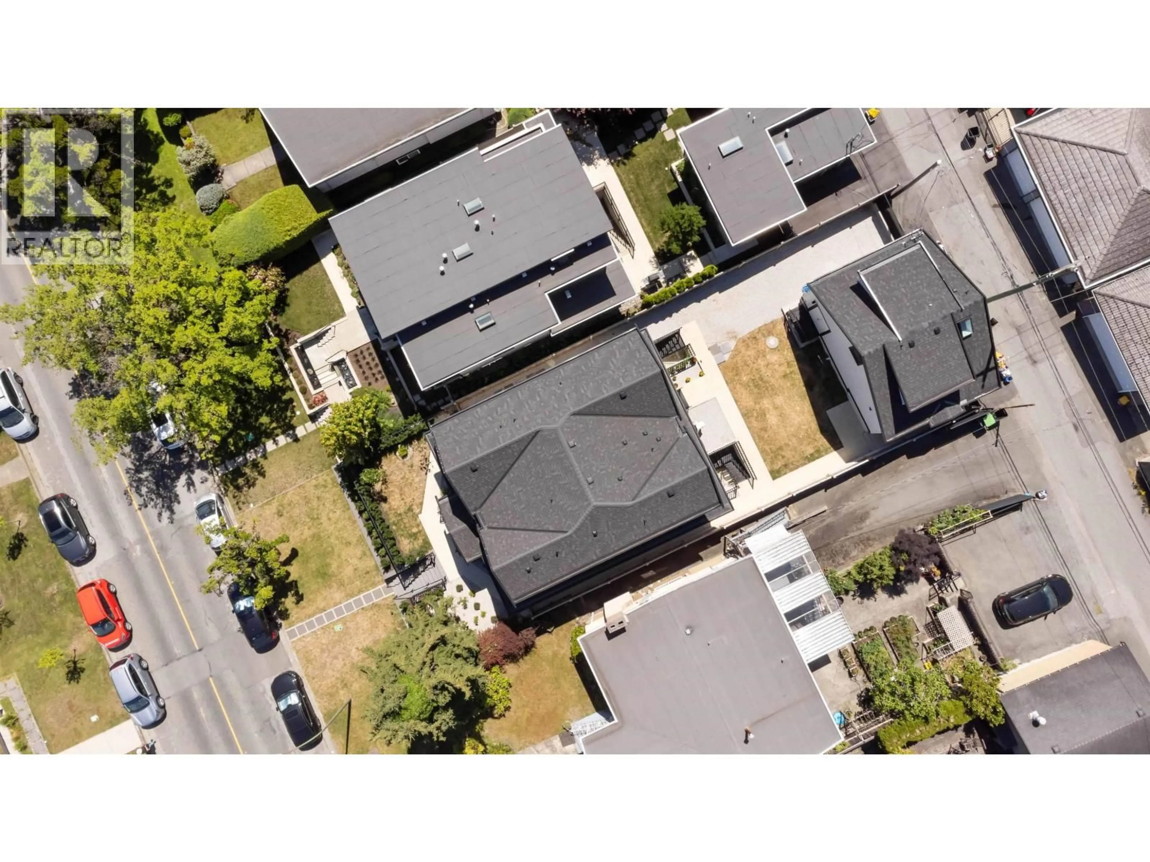 A pic from outside/outdoor area/front of a property/back of a property/a pic from drone, street for 8007 ELLIOTT STREET, Vancouver British Columbia V5S2P3