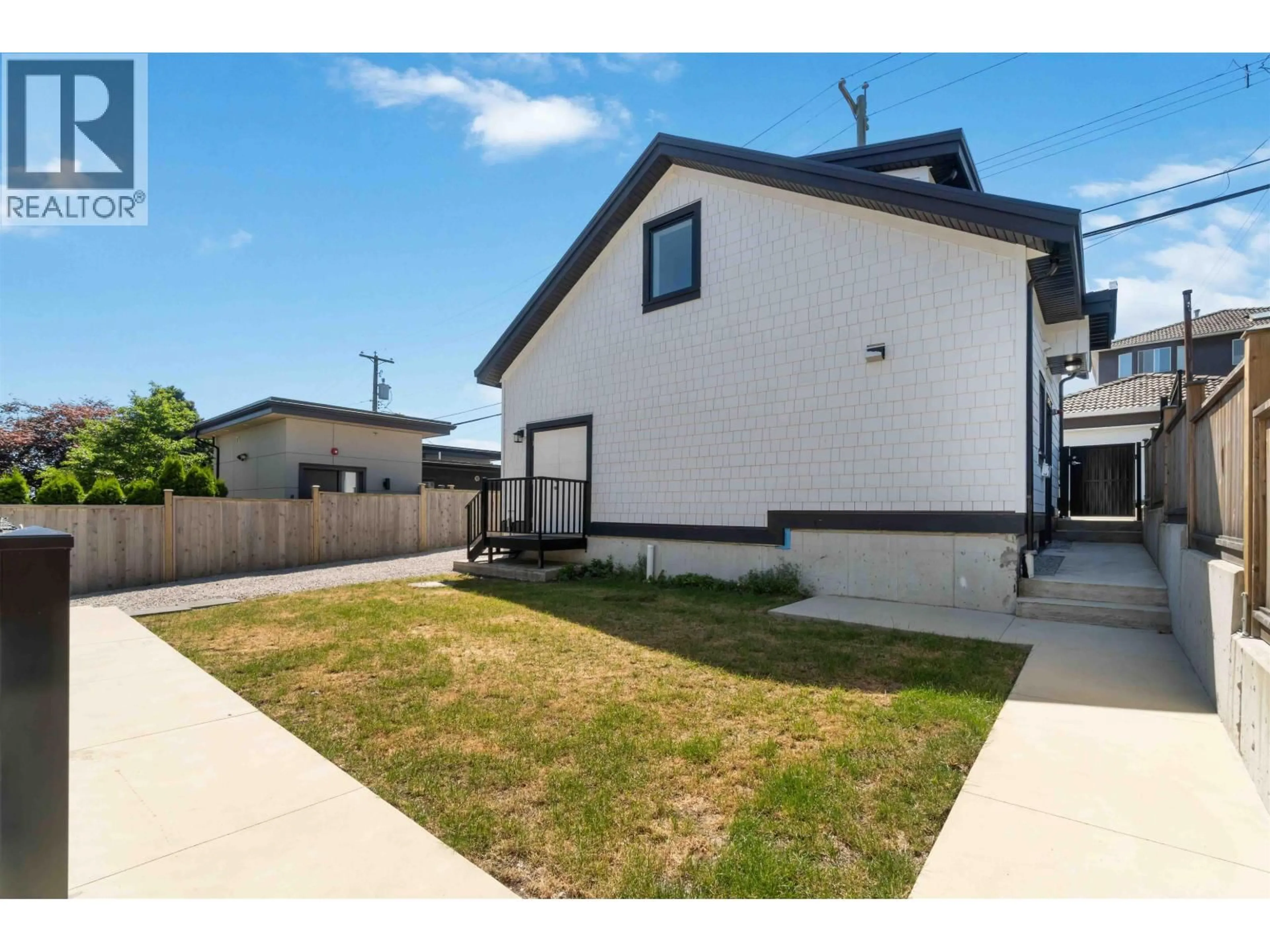 A pic from outside/outdoor area/front of a property/back of a property/a pic from drone, street for 8007 ELLIOTT STREET, Vancouver British Columbia V5S2P3