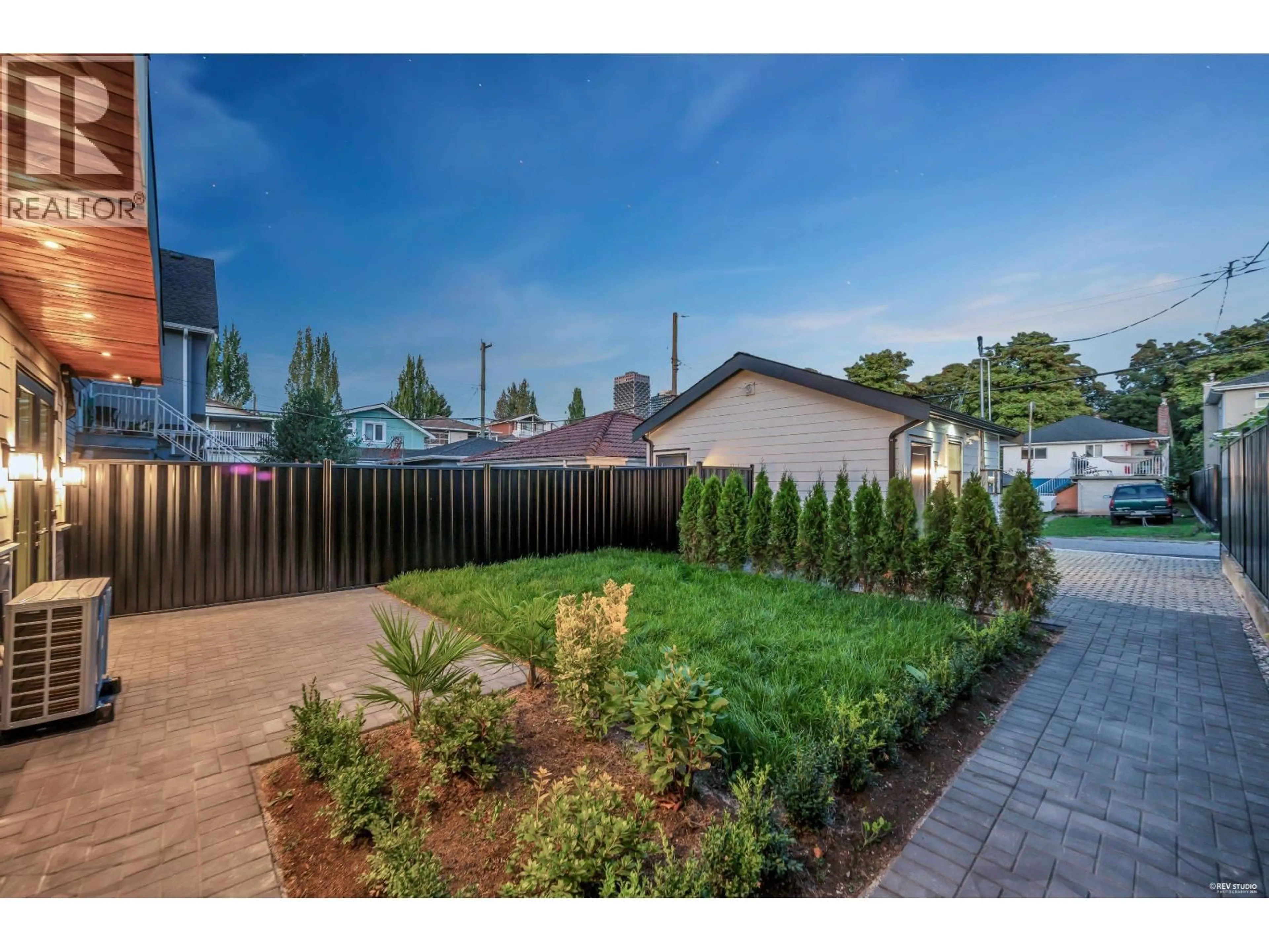 A pic from outside/outdoor area/front of a property/back of a property/a pic from drone, street for 2 - 5150 SPENCER STREET, Vancouver British Columbia V5R4A3