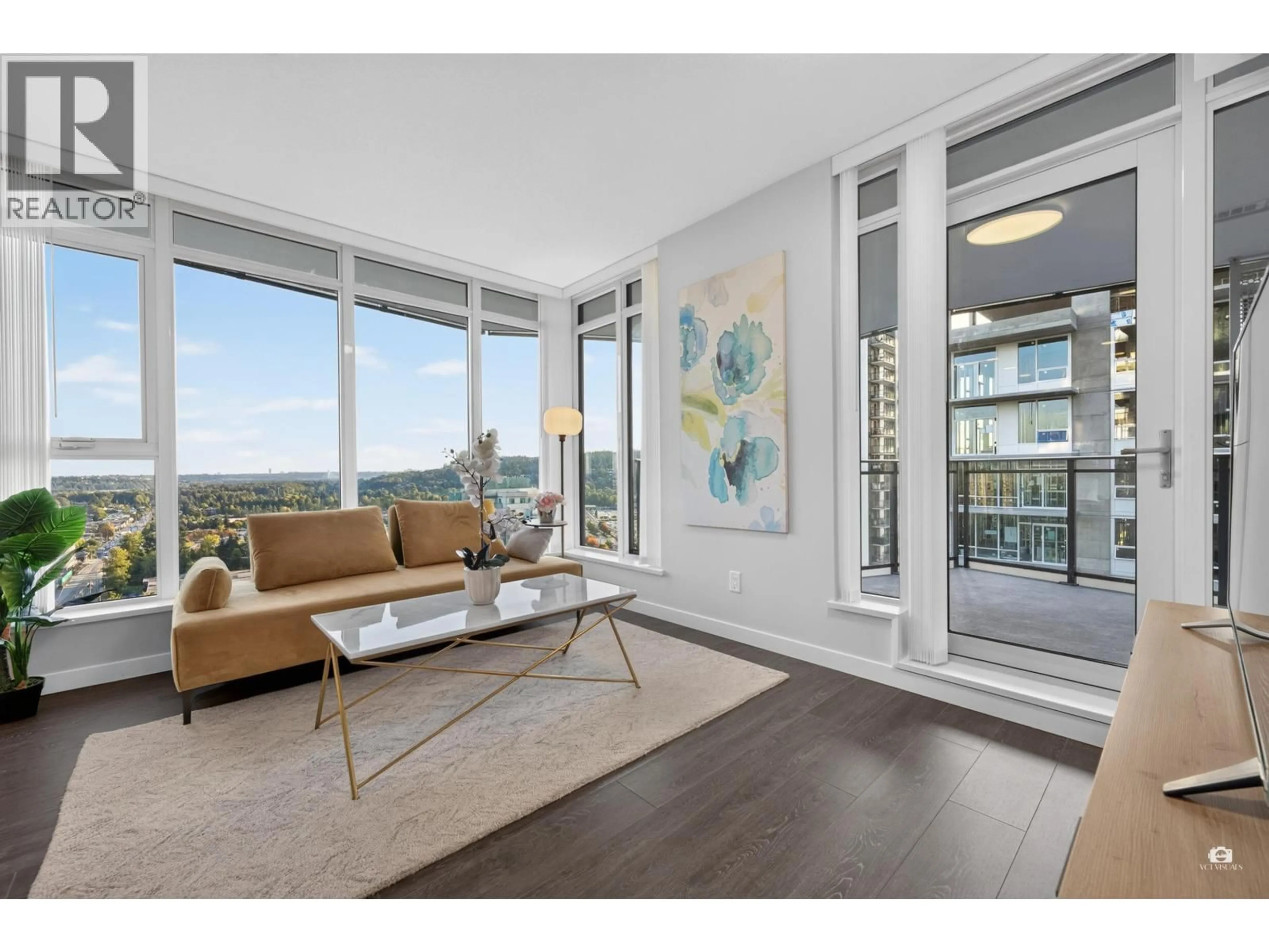 Living room with furniture, wood/laminate floor for 2206 - 1182 WESTWOOD STREET, Coquitlam British Columbia V3B0T9