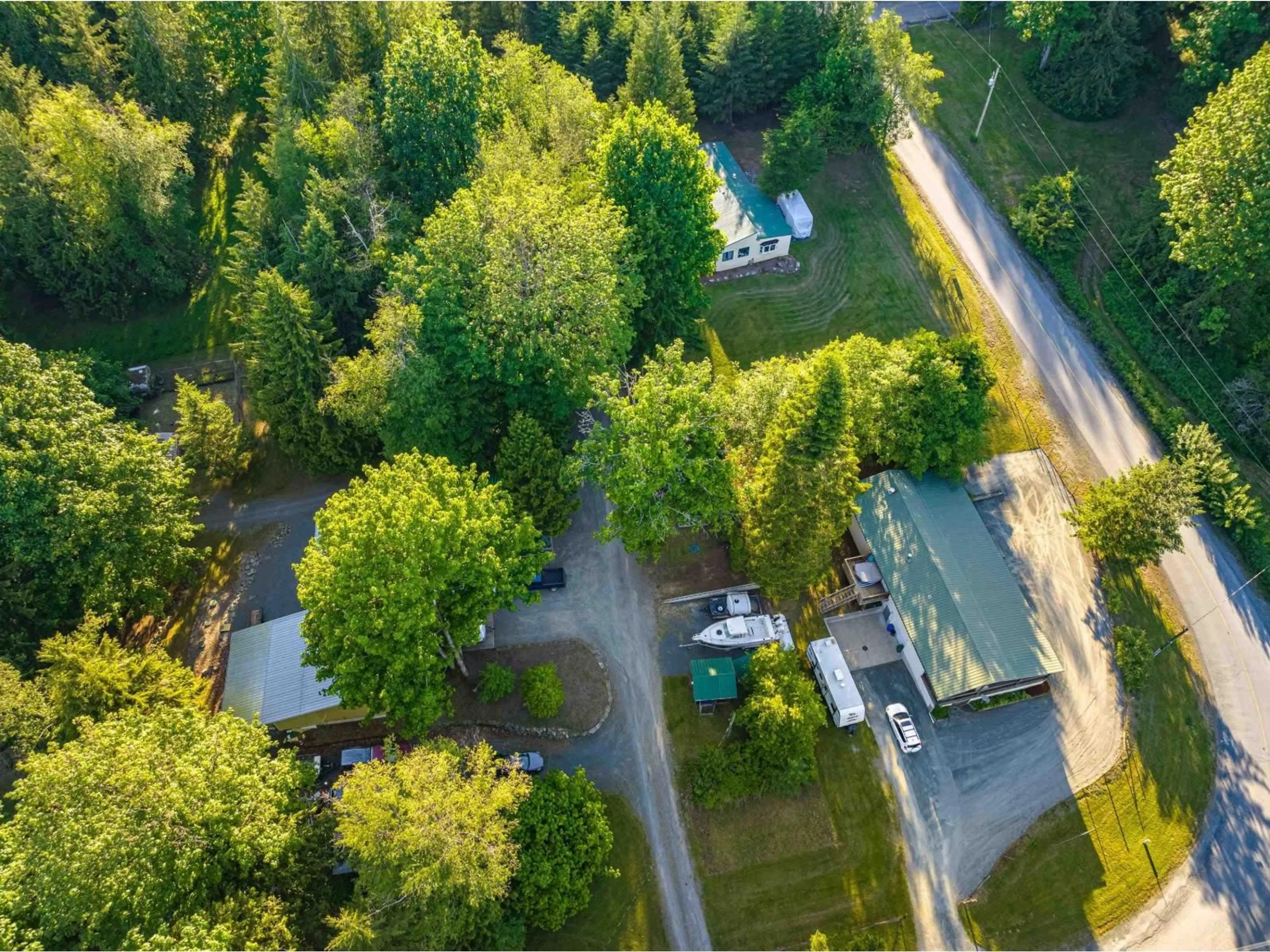 A pic from outside/outdoor area/front of a property/back of a property/a pic from drone, forest/trees view for 47400 EXTROM ROAD, Chilliwack British Columbia V2R4T1