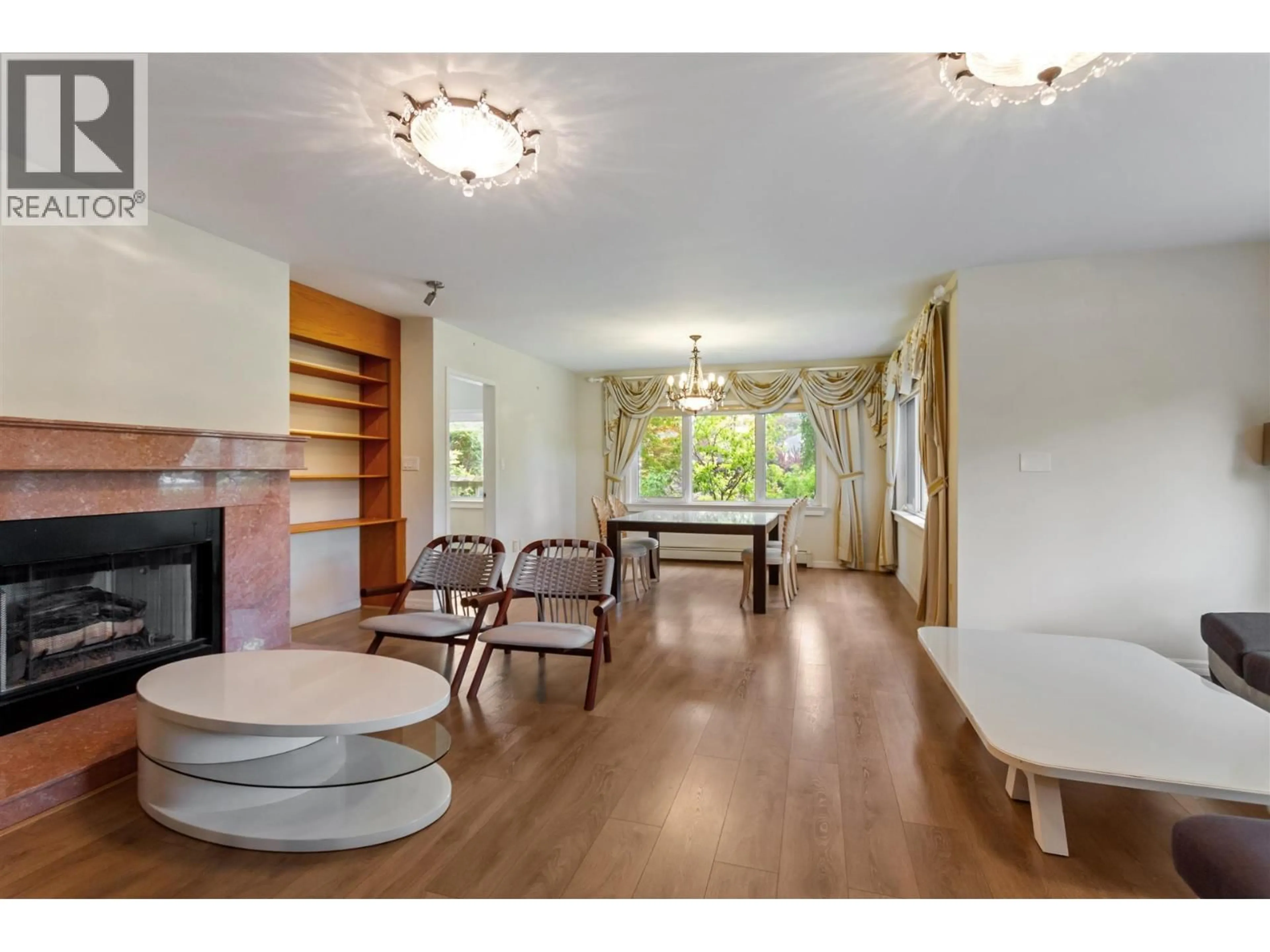 Living room with furniture, wood/laminate floor for 1806 WESTERN PARKWAY, Vancouver British Columbia V6T1V4