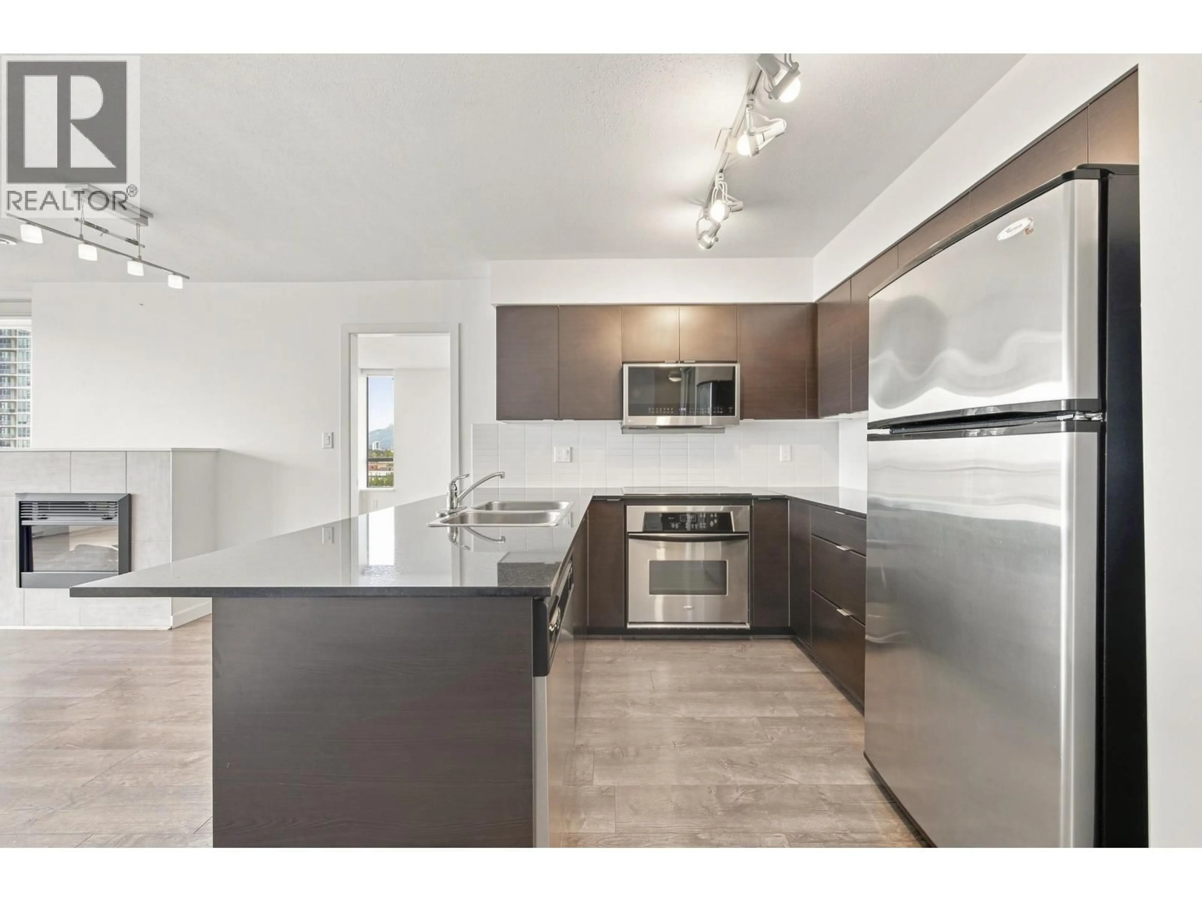 Open concept kitchen, unknown for 1806 - 4182 DAWSON STREET, Burnaby British Columbia V5C0A4