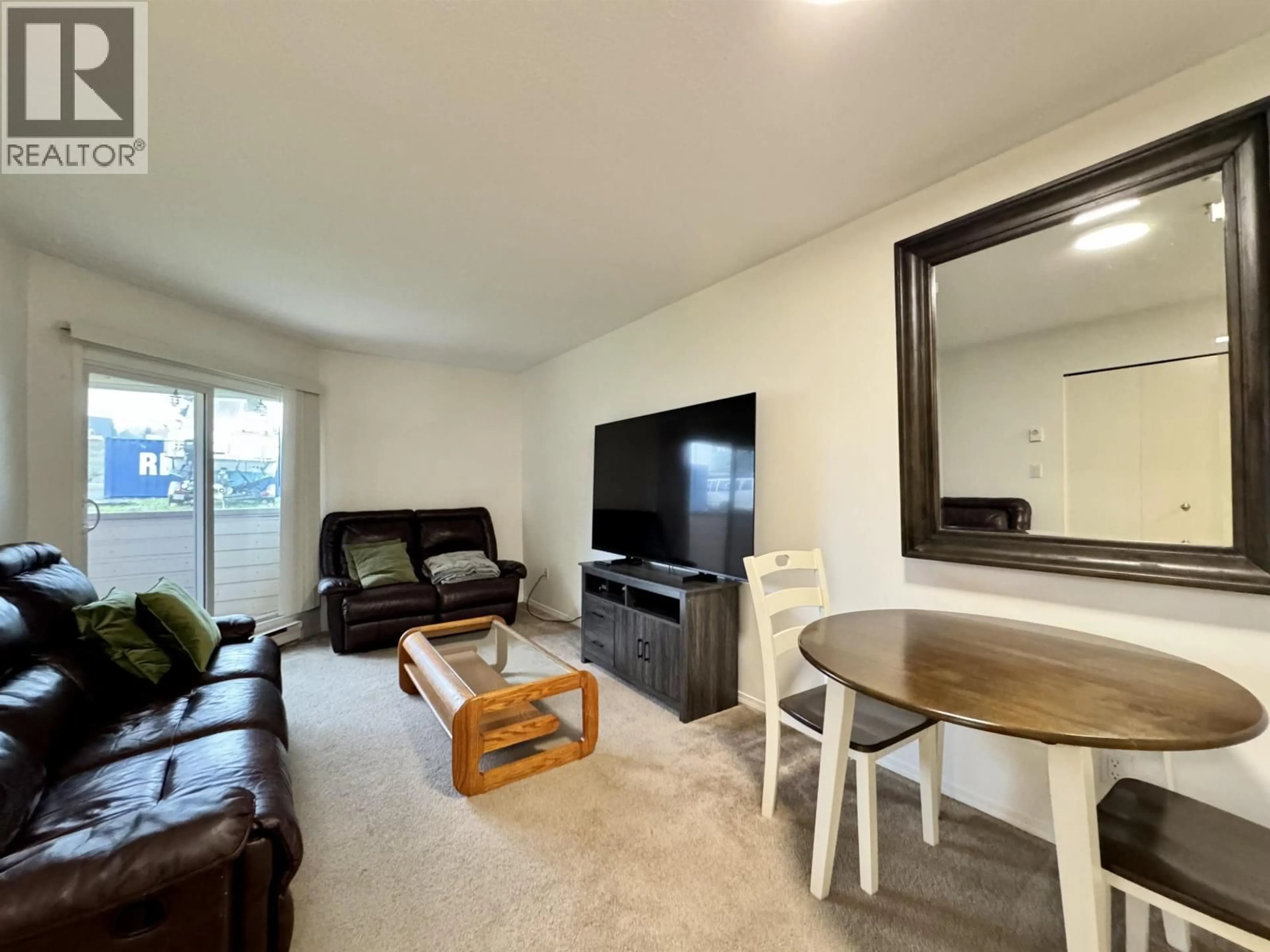 Living room with furniture, wood/laminate floor for 207 - 840 PRINCE RUPERT BOULEVARD, Prince Rupert British Columbia V8J4H5