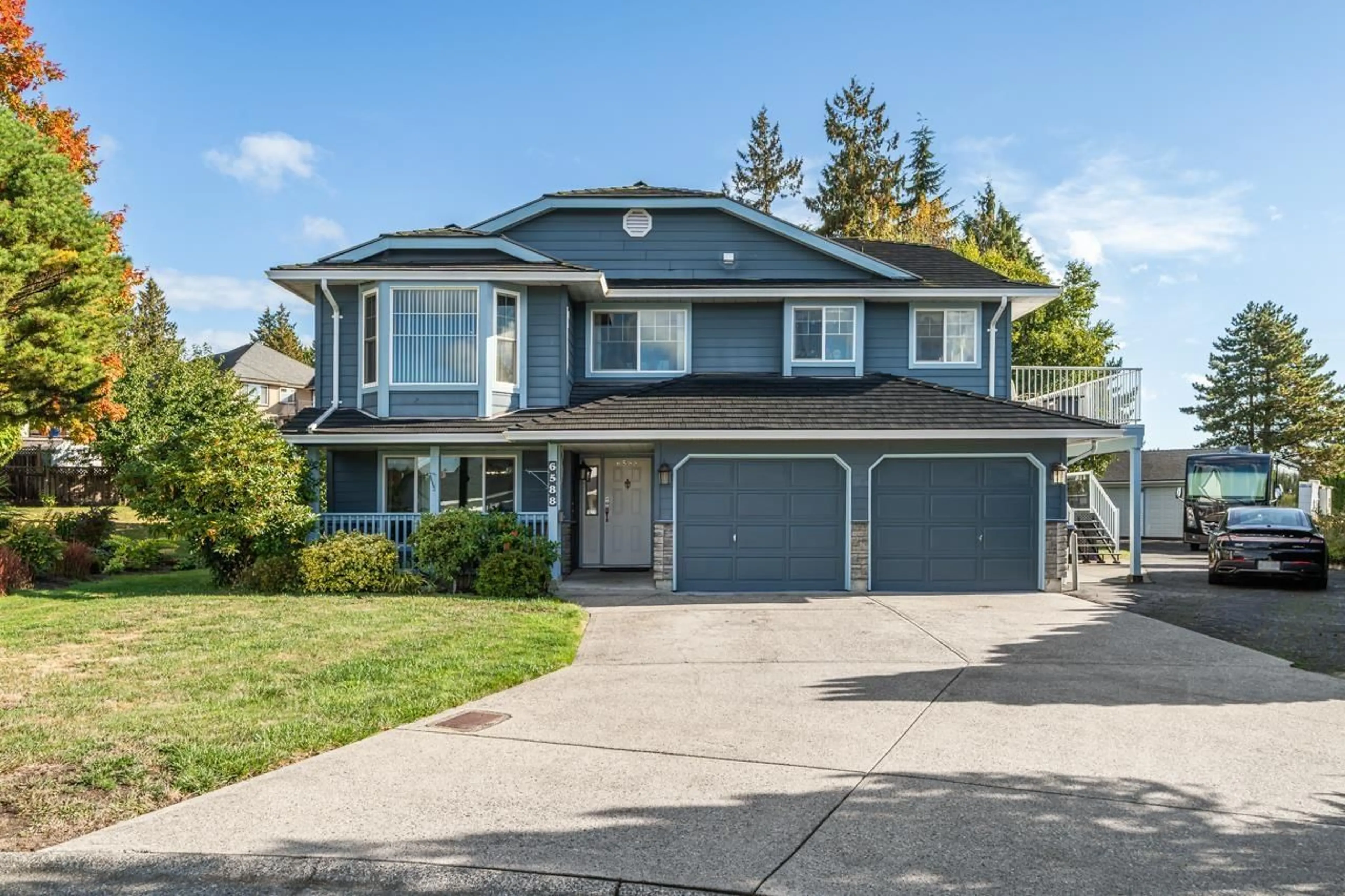 Home with vinyl exterior material, street for 6588 148A STREET, Surrey British Columbia V3S7A2