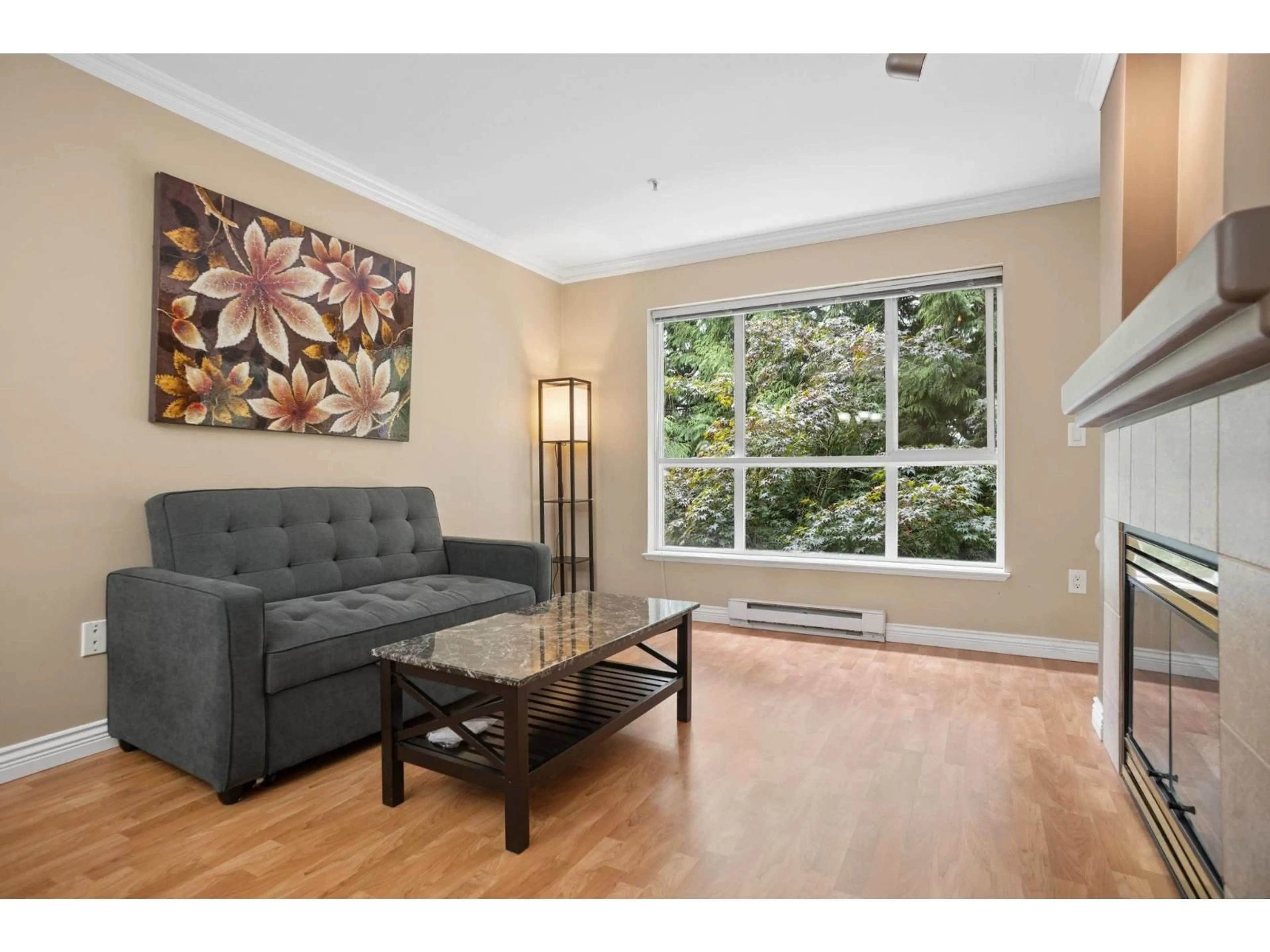 Living room with furniture, wood/laminate floor for 322 - 9979 140 STREET STREET, Surrey British Columbia V3T5W2