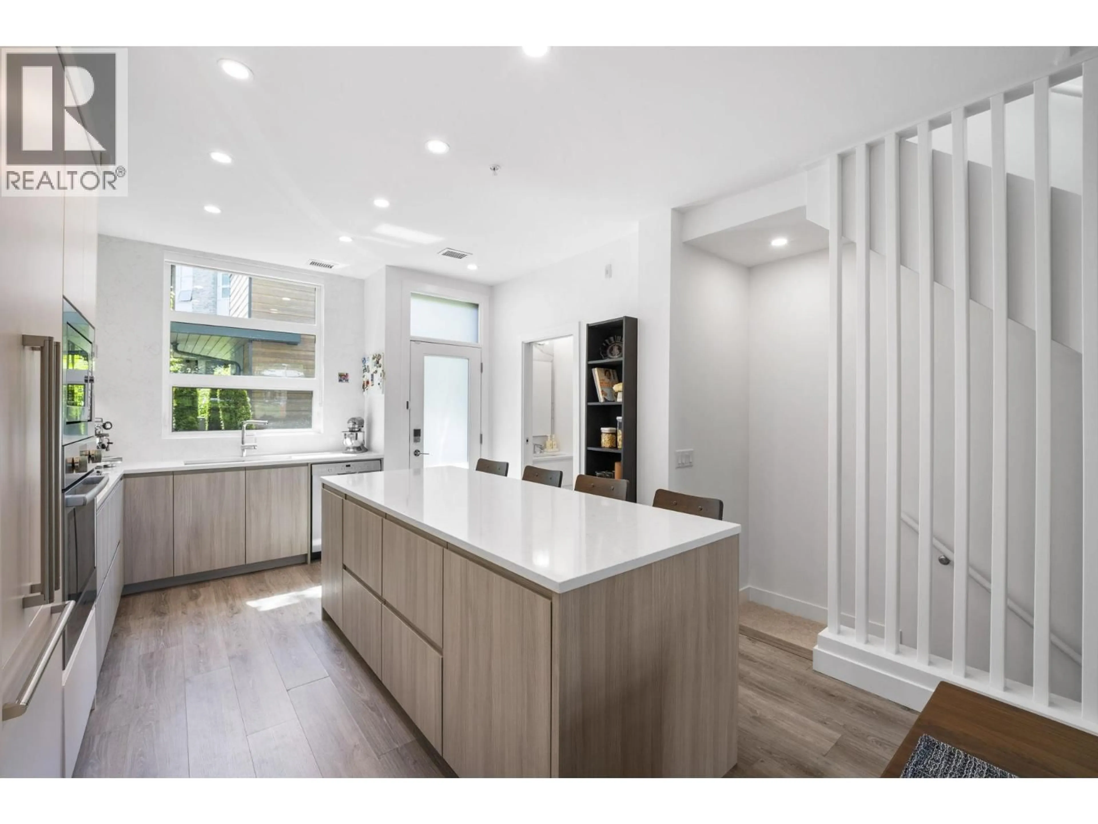 Open concept kitchen, unknown for 153 - 2060 CURLING ROAD, North Vancouver British Columbia V7P0E1