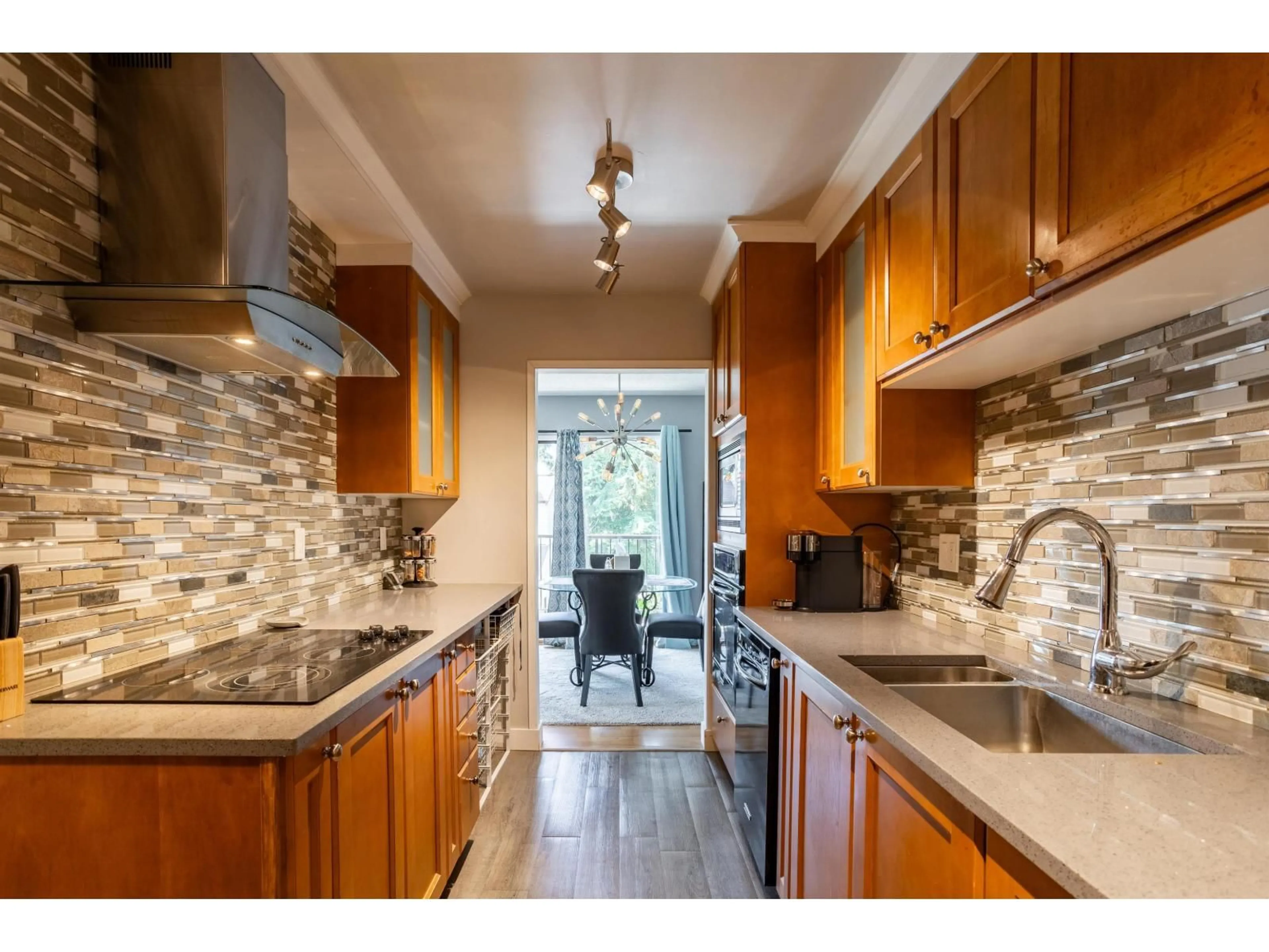 Open concept kitchen, ceramic/tile floor for 210 - 5191 203 STREET, Langley British Columbia V3A1V6