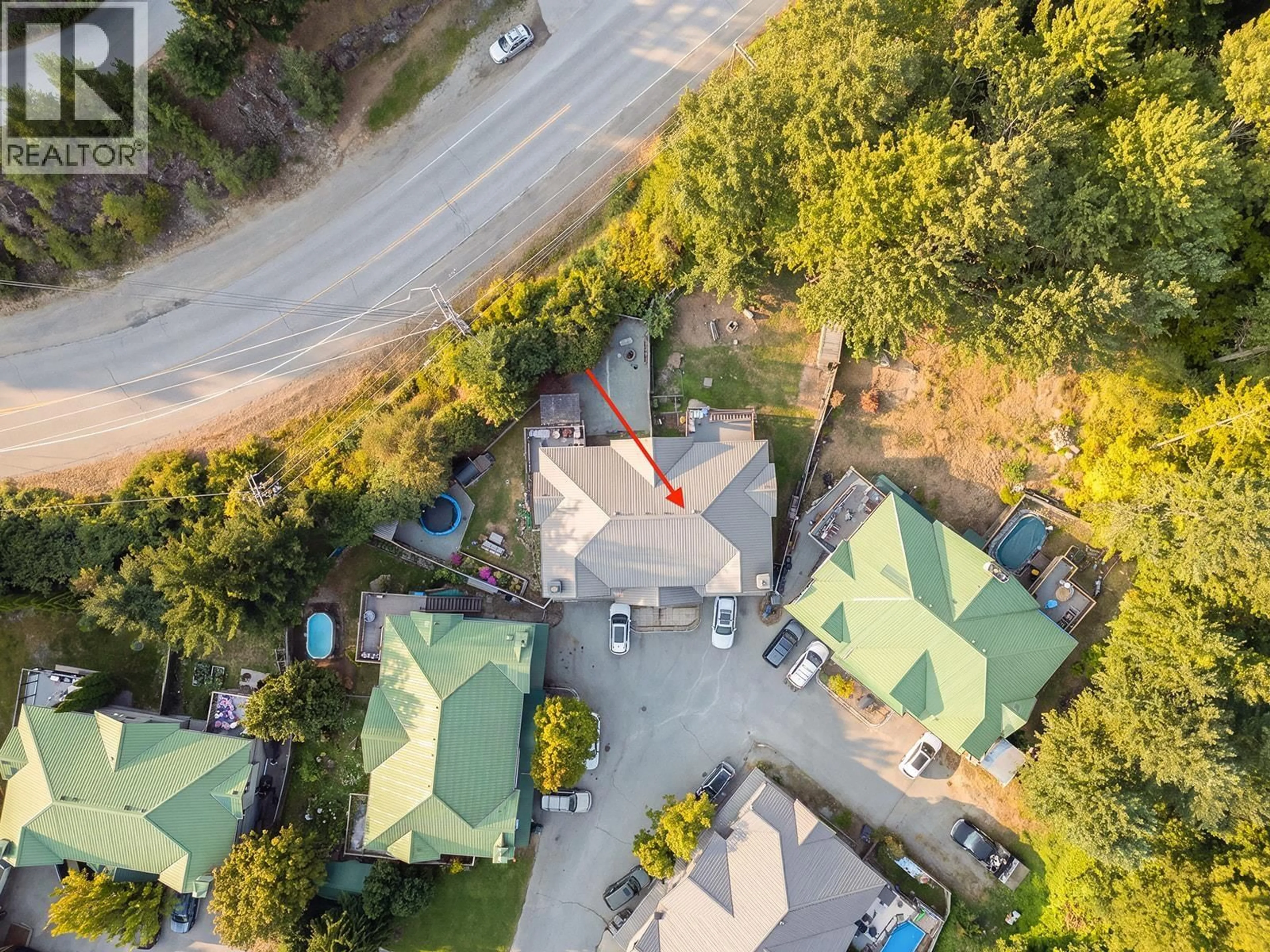 A pic from outside/outdoor area/front of a property/back of a property/a pic from drone, street for 9 - 7467 PROSPECT STREET, Pemberton British Columbia V0N2L1