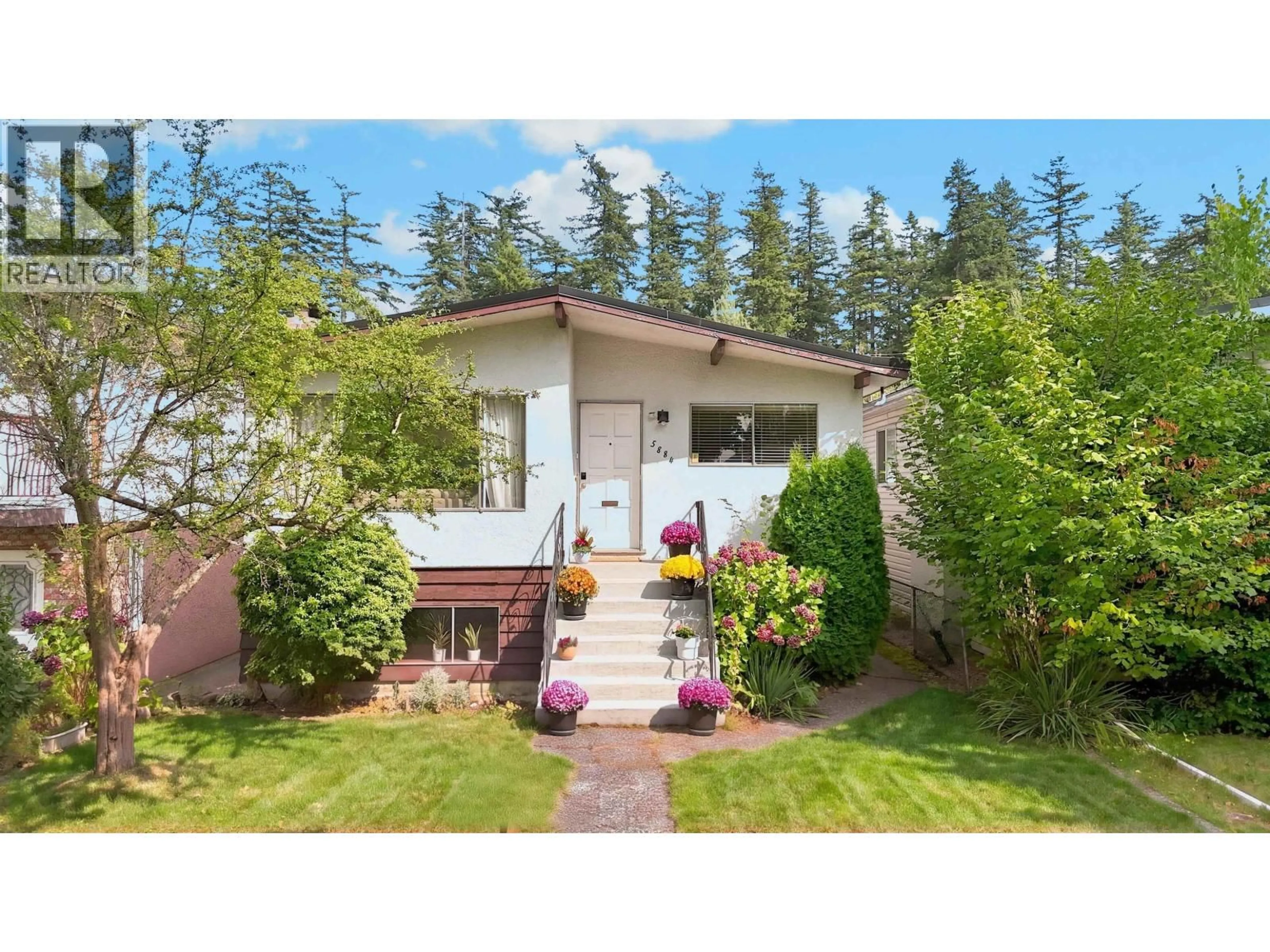 Home with vinyl exterior material, street for 5884 ORMIDALE STREET, Vancouver British Columbia V5R4R3