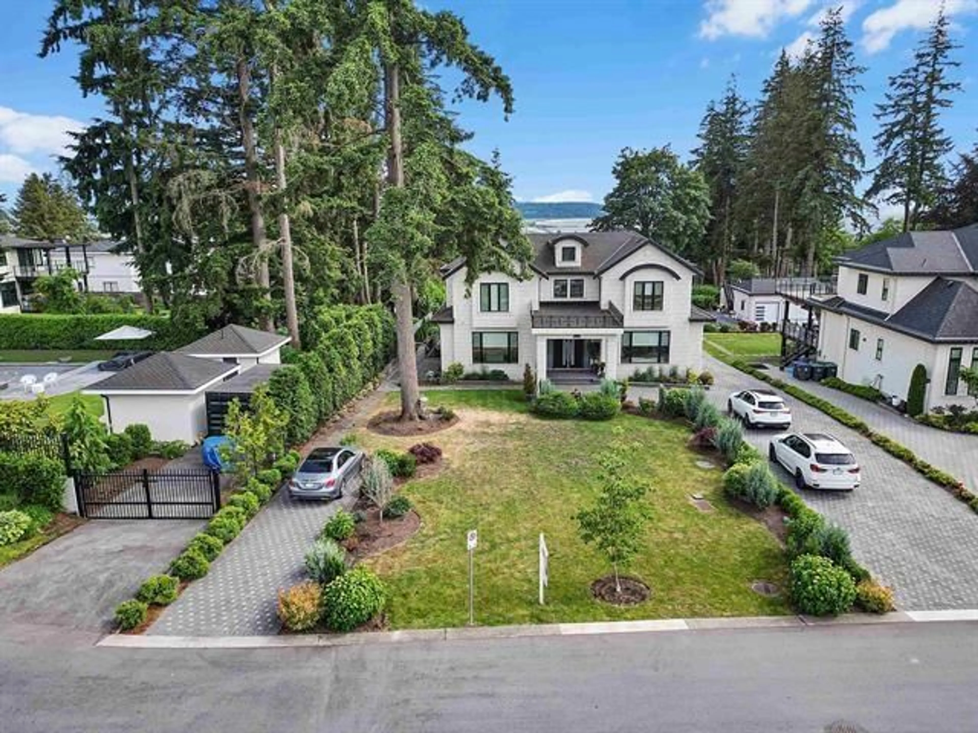 A pic from outside/outdoor area/front of a property/back of a property/a pic from drone, street for 13170 57 AVENUE, Surrey British Columbia V3X0K2