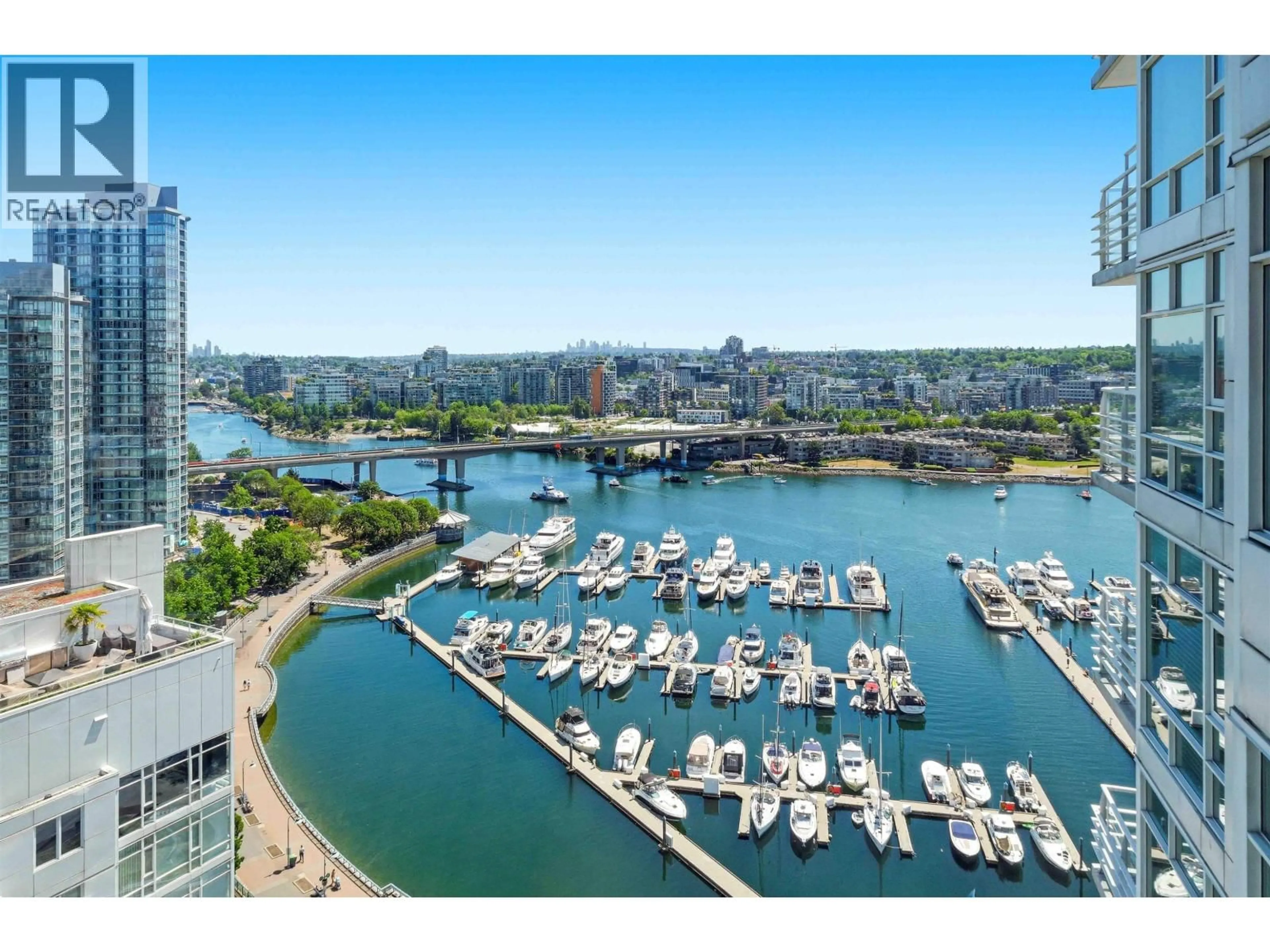 A pic from outside/outdoor area/front of a property/back of a property/a pic from drone, water/lake/river/ocean view for 2303 - 1199 MARINASIDE CRESCENT, Vancouver British Columbia V6Z2Y2