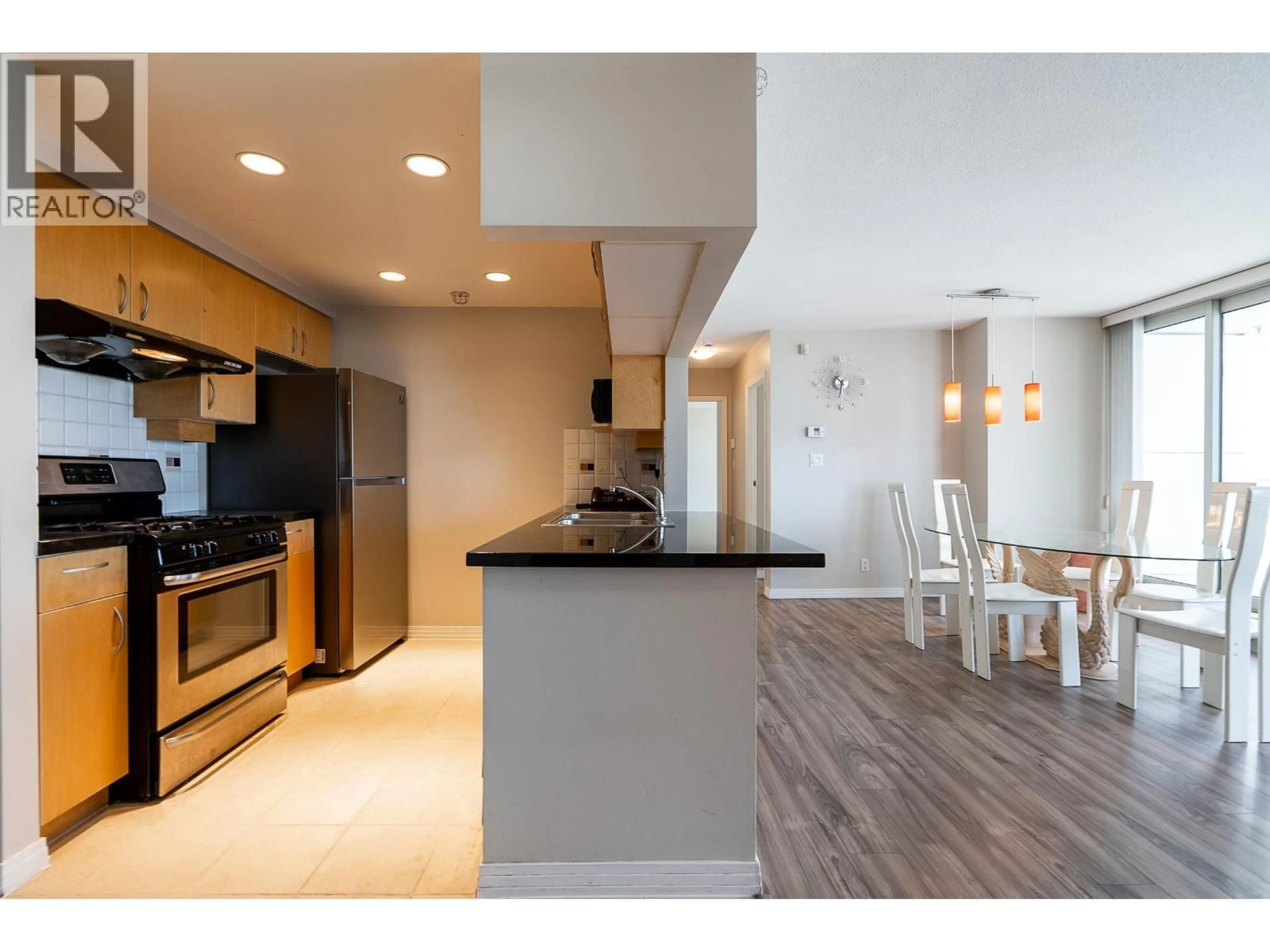 Open concept kitchen, unknown for 2303 - 1199 MARINASIDE CRESCENT, Vancouver British Columbia V6Z2Y2