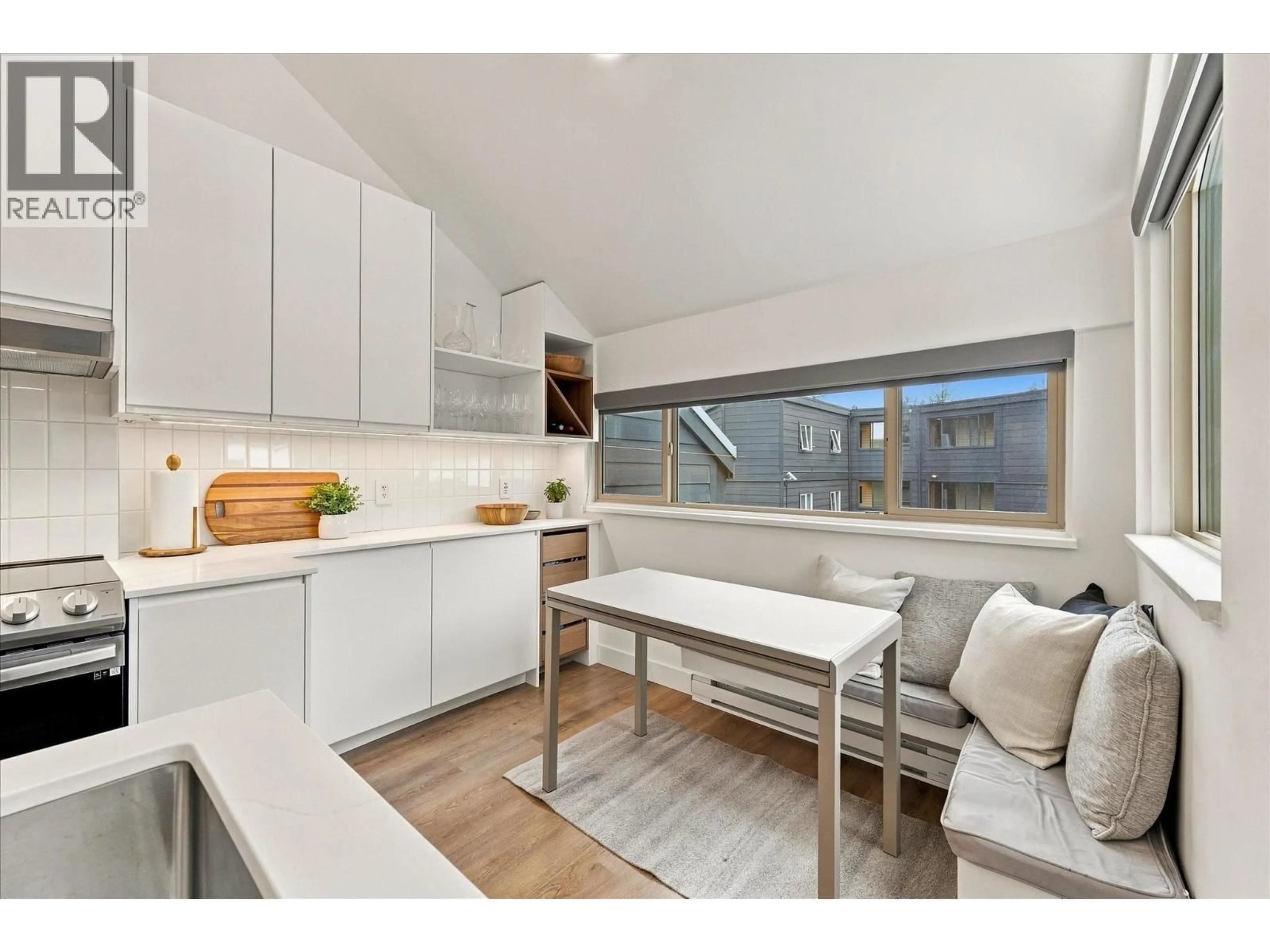 Open concept kitchen, wood/laminate floor for 9 - 2110 WHISTLER ROAD, Whistler British Columbia V8E0A6