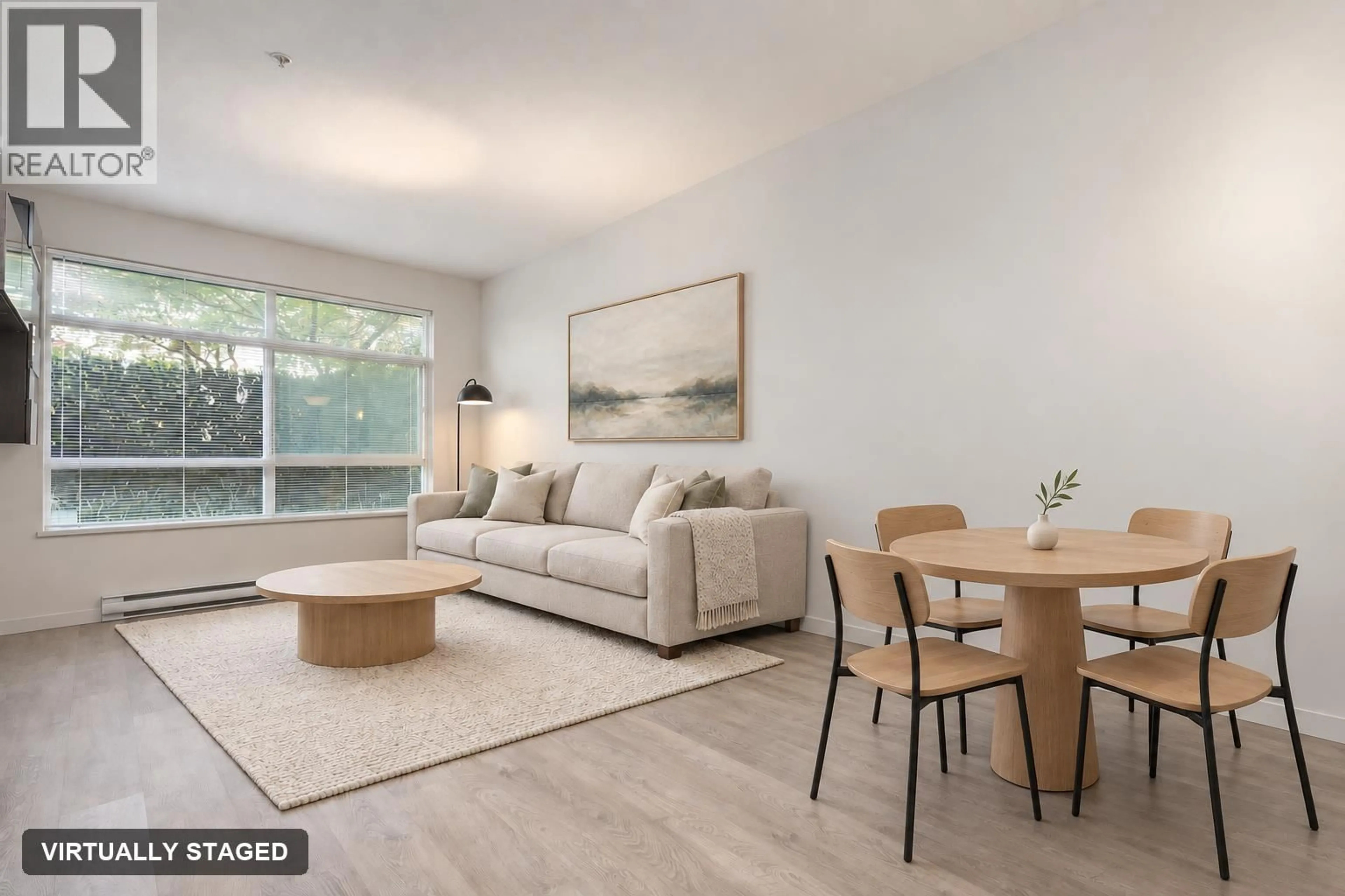 Living room with furniture, wood/laminate floor for 101 - 617 SMITH AVENUE, Coquitlam British Columbia V3J0C3