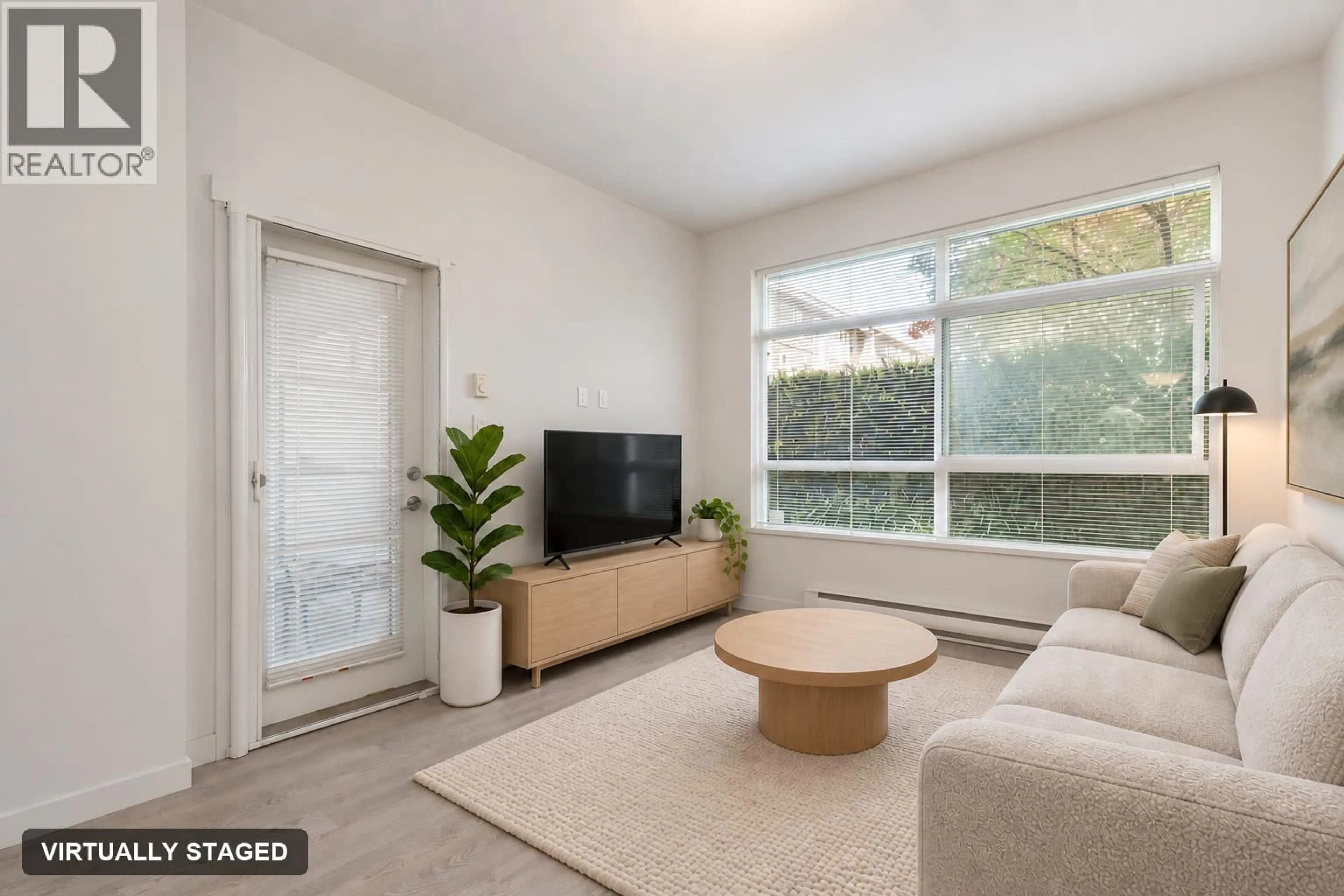 Living room with furniture, unknown for 101 - 617 SMITH AVENUE, Coquitlam British Columbia V3J0C3