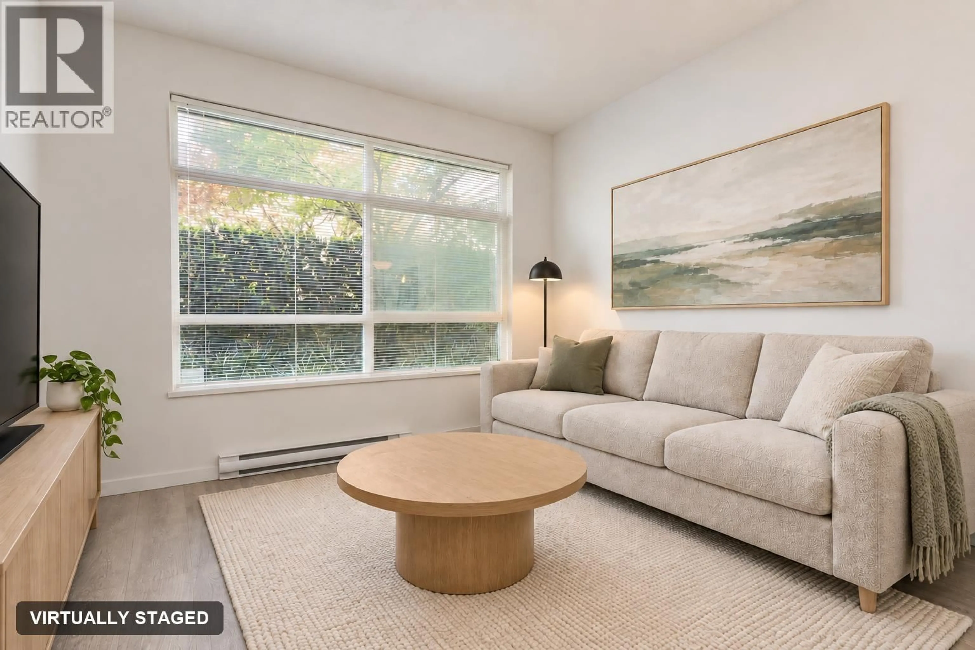 Living room with furniture, unknown for 101 - 617 SMITH AVENUE, Coquitlam British Columbia V3J0C3