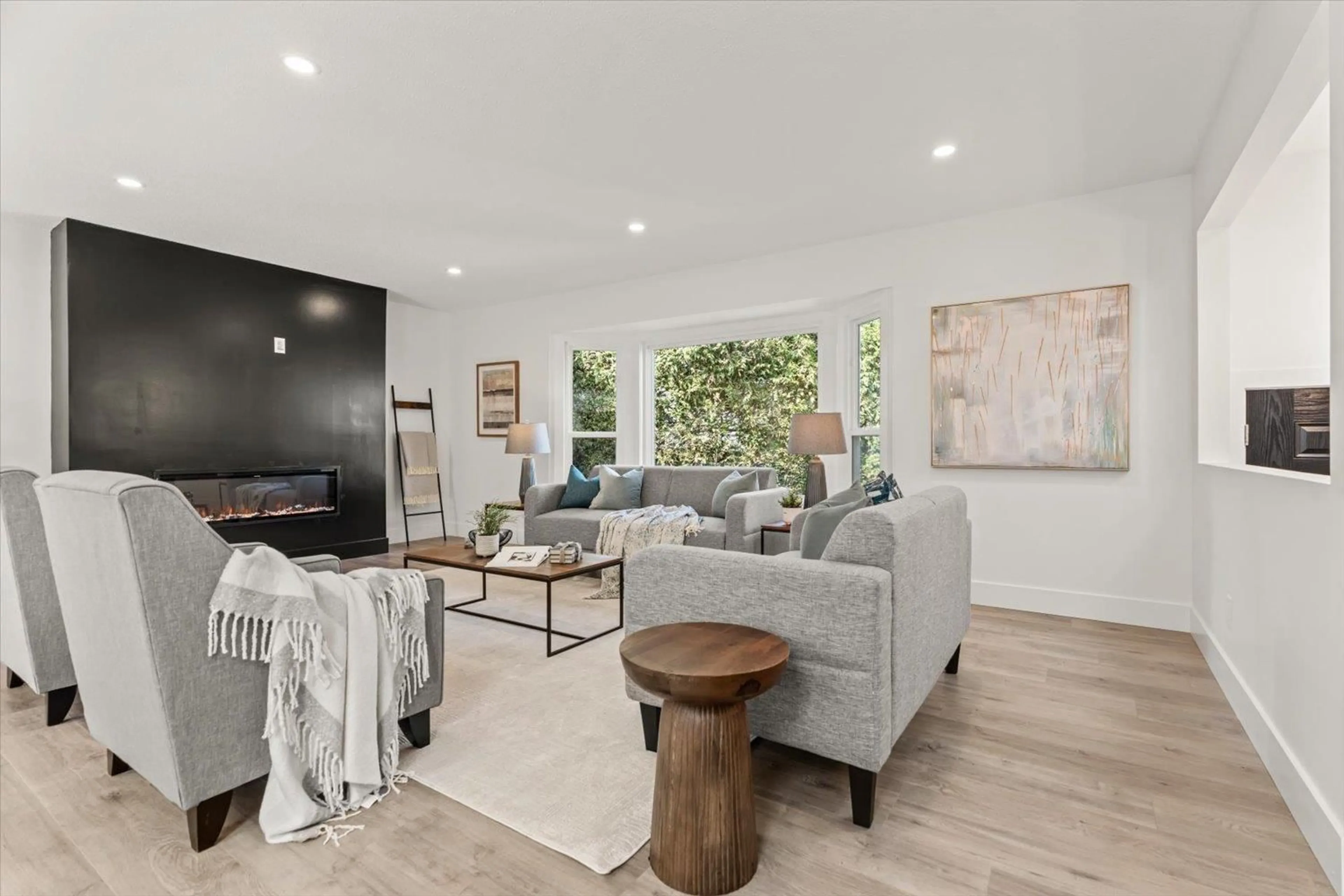 Living room with furniture, wood/laminate floor for 6425 SWANSON STREET, Chilliwack British Columbia V2R1R2
