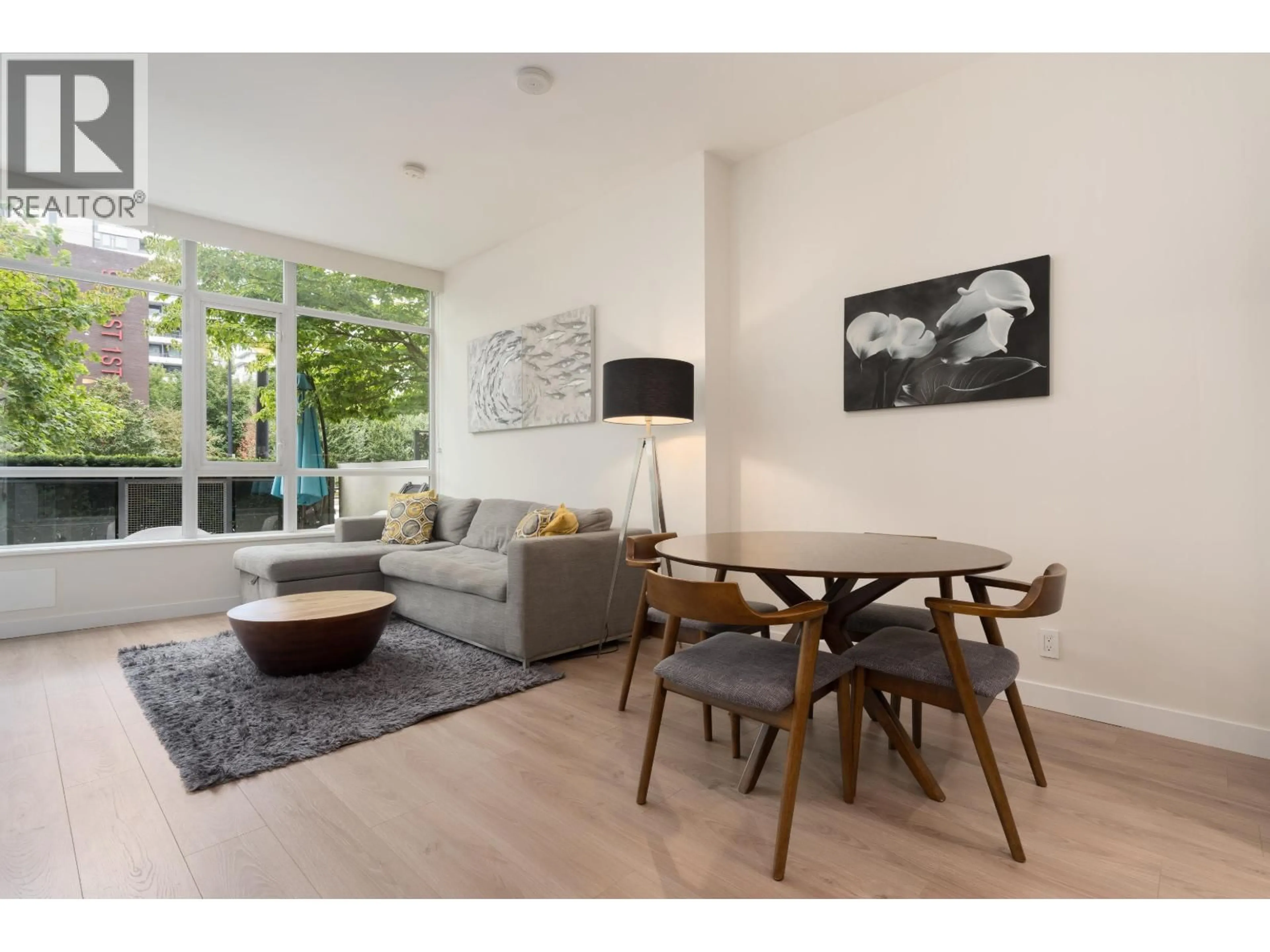 Living room with furniture, wood/laminate floor for 1680 QUEBEC STREET, Vancouver British Columbia V6A3L6