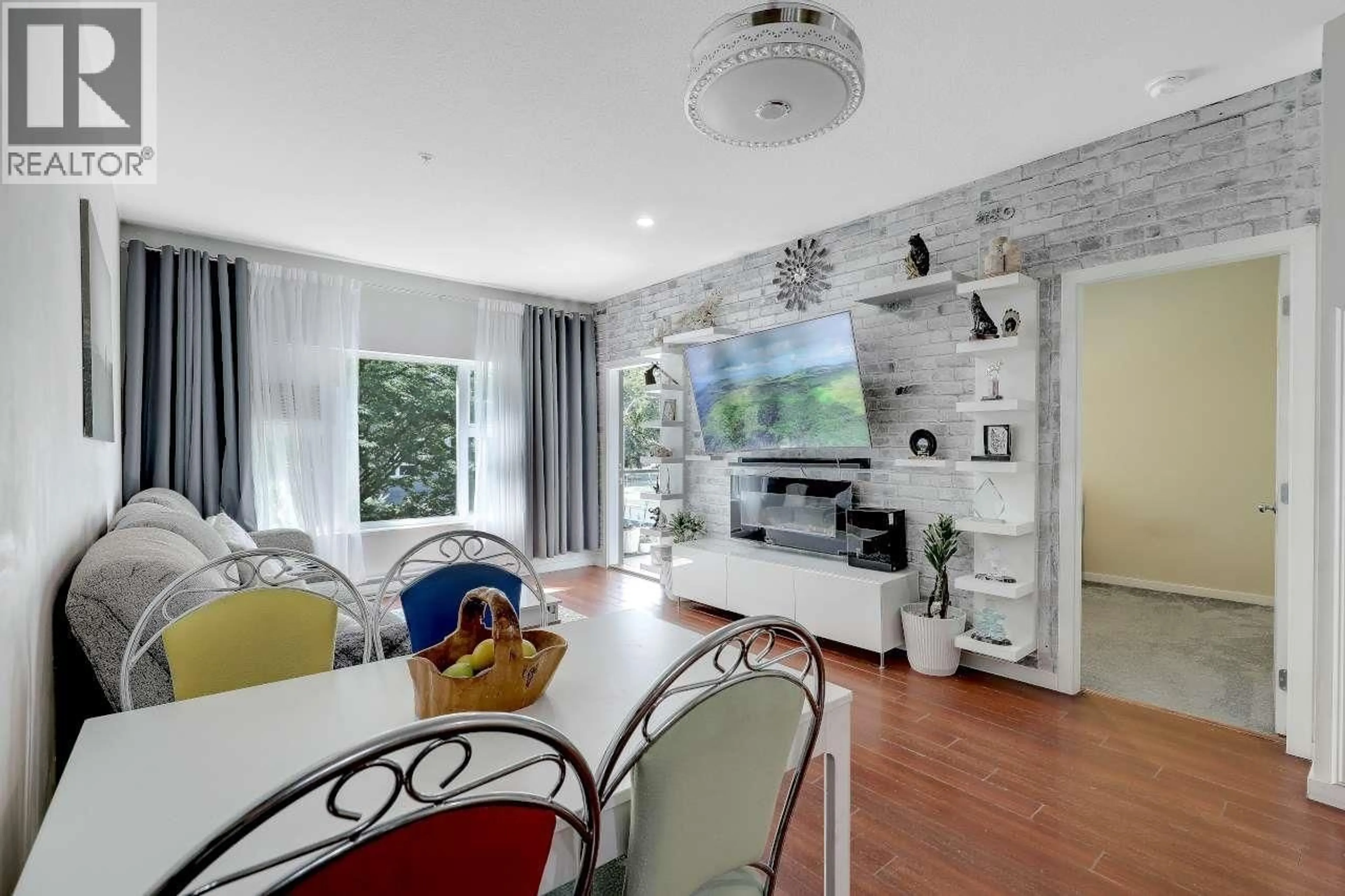 Living room with furniture, unknown for 208 - 2488 KELLY AVENUE, Port Coquitlam British Columbia V3C1Y4