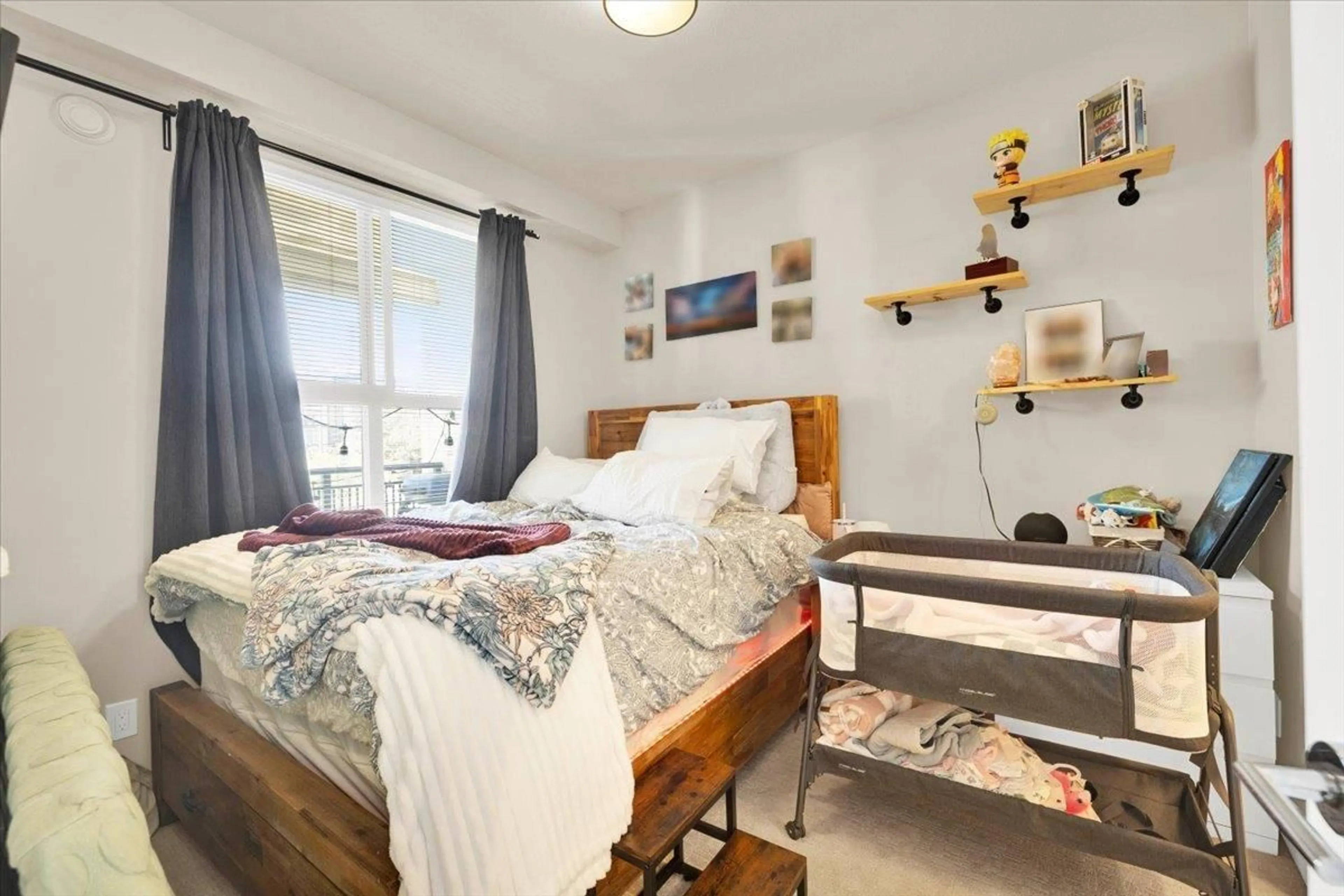 Bedroom with bed, wood/laminate floor for C219 - 8150 207 STREET, Langley British Columbia V2Y4J4